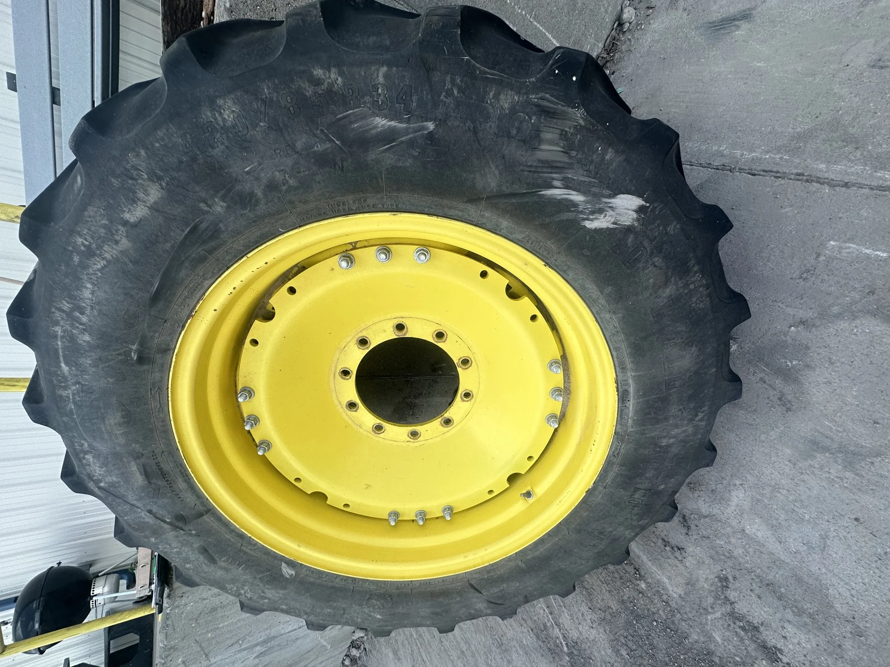 Used 57% 420/85R34 Firestone Radial All Traction DT (147B) on 15 x 34 JD Yellow 3 Bolt Waffle