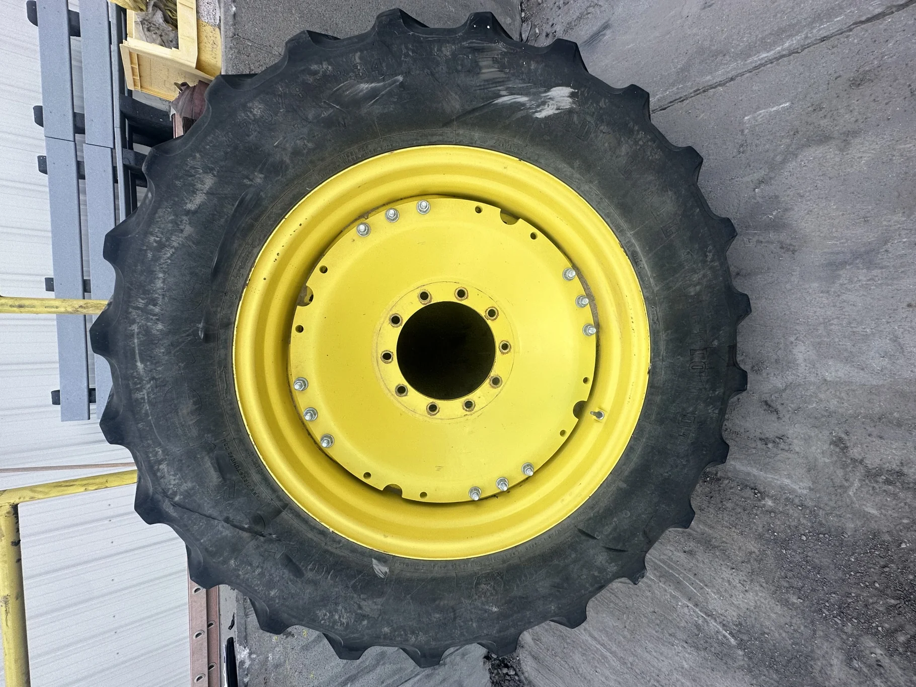 Used 57% 420/85R34 Firestone Radial All Traction DT (147B) on 15 x 34 JD Yellow 3 Bolt Waffle image 2