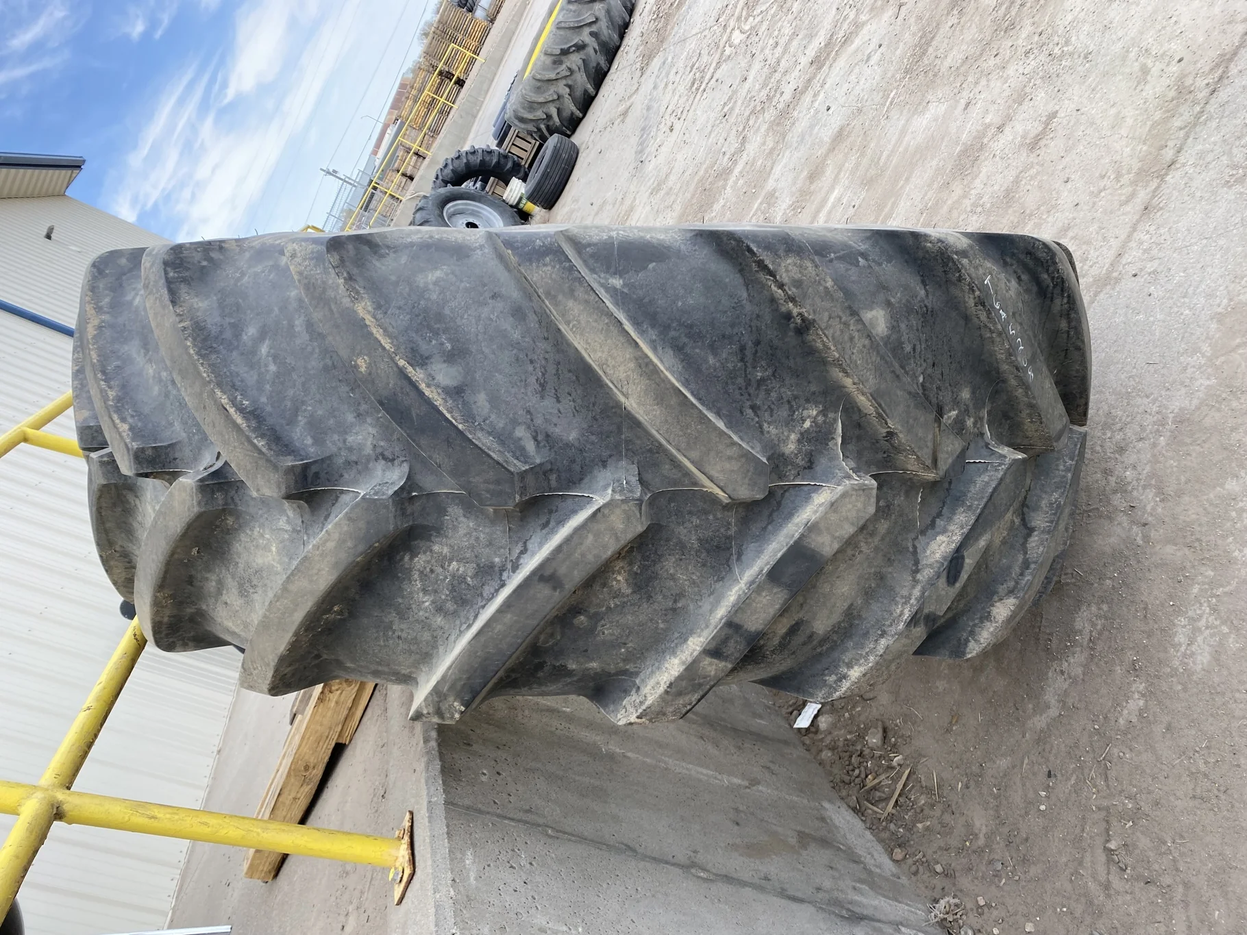 Used 98% 710/70R42 Michelin MachXBib R-1W 173D TL on a 23 x 42 JD Yellow 12 Bolt (.945) Stub D image 3