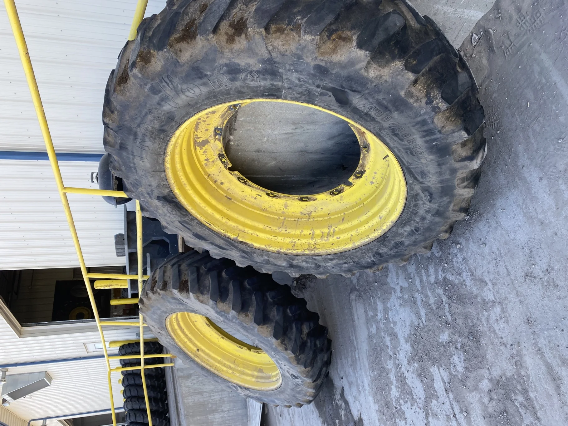 Used 40% 480/80R46 Firestone Radial All Traction 23 R-1 (158B) TL on a 16 x 46 JD Yellow 12 B