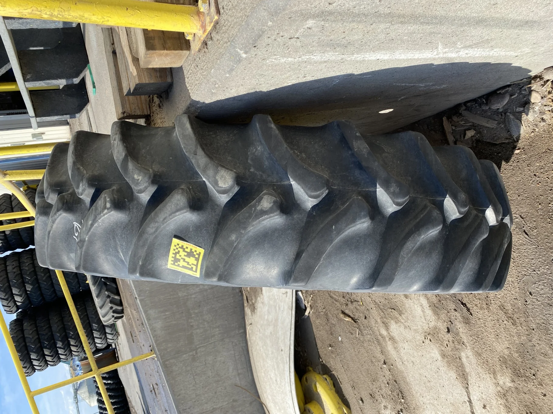 Used 65% 380/80R38 Firestone Radial All Traction Deep Tread (142A8) R-1W TL on a 12 x 38 JD Ye image 3