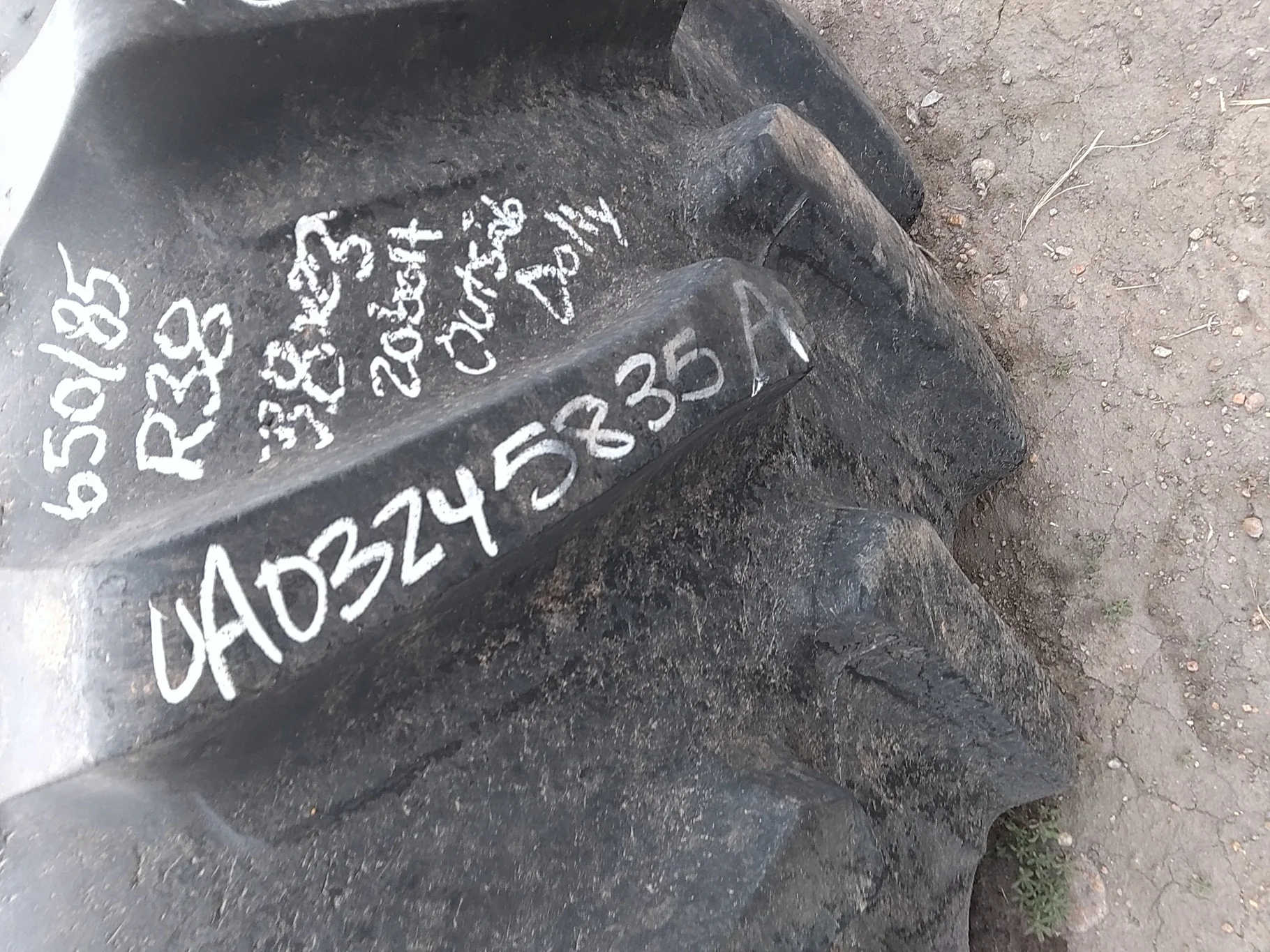 Used 85% 650/85R38 Firestone Radial Deep Tread 23 R-1W 173B TL on 23 X 38 JD Yellow 20B Outside