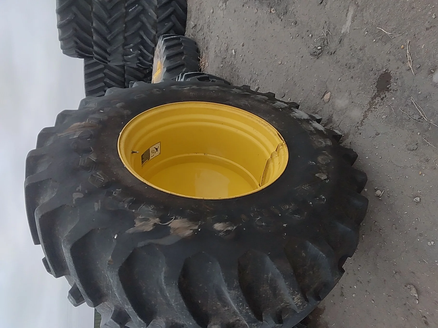 Used 85% 650/85R38 Firestone Radial Deep Tread 23 R-1W 173B TL on 23 X 38 JD Yellow 20B Outside image 4