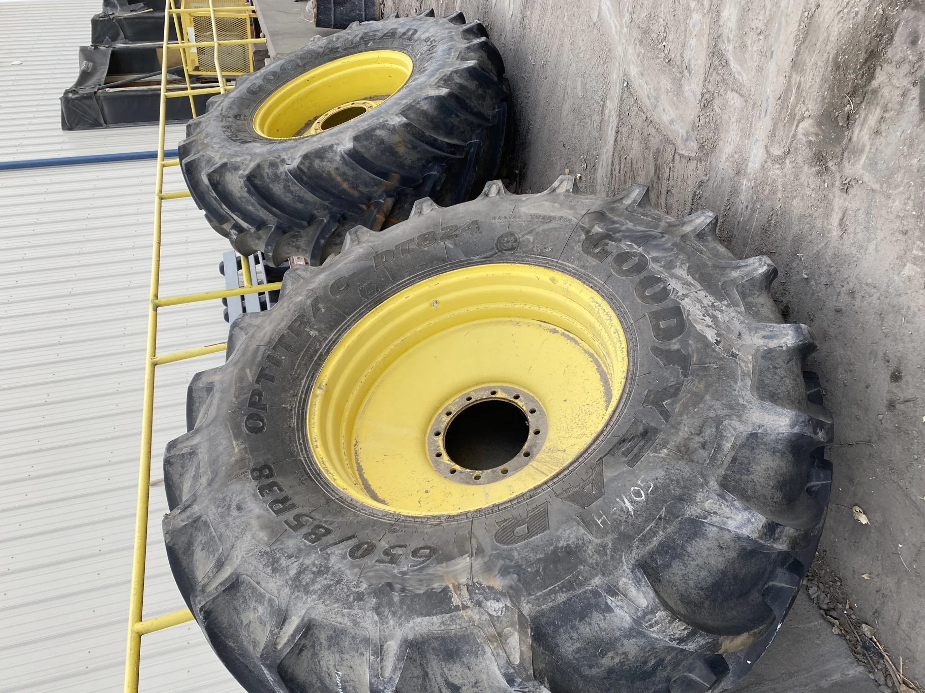 Used 98% 650/85R38 Goodyear Optitrac DT824 R-1W (173A8/173B) TL (tear in bead, slight road wear - go image 2