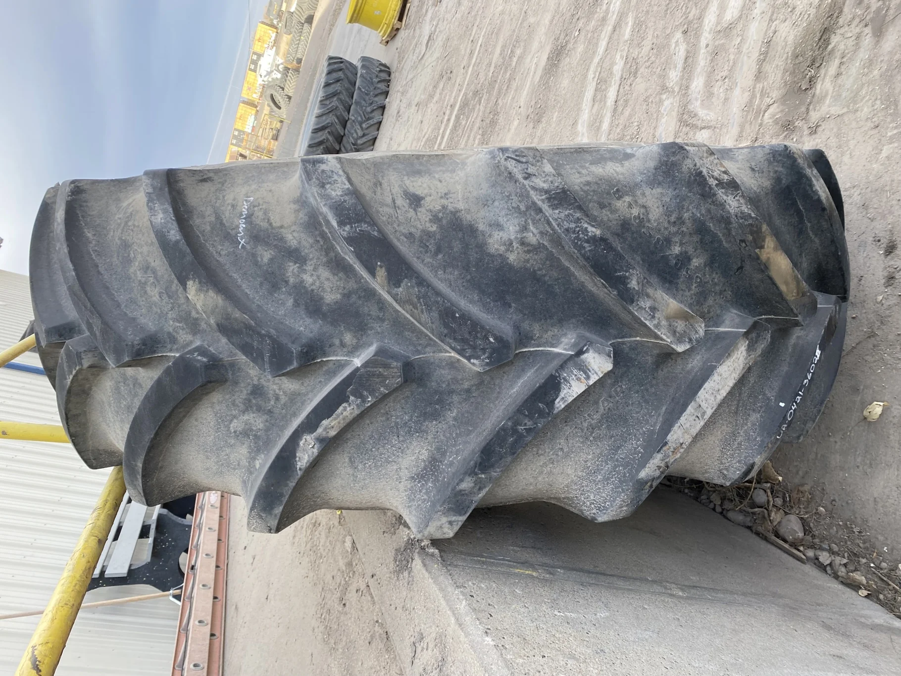 Used 98% 650/85R38 Goodyear Optitrac DT824 R-1W (173A8/173B) TL (tear in bead, slight road wear - go image 3