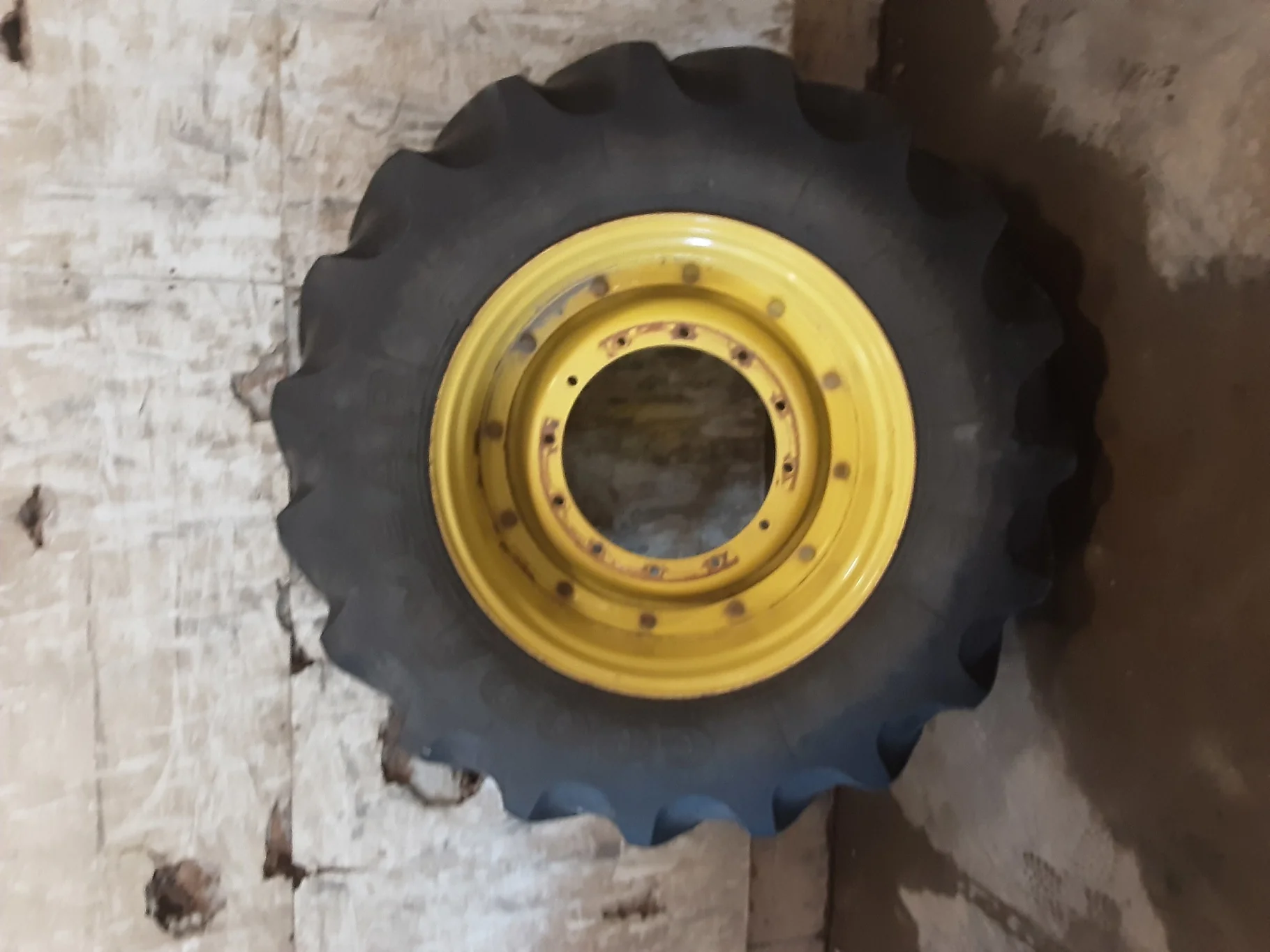 Used 60% 480/70R34 Goodyear Super Traction DT810 R-1W (155B) TL on a 15 x 34 JD Yellow Straigh