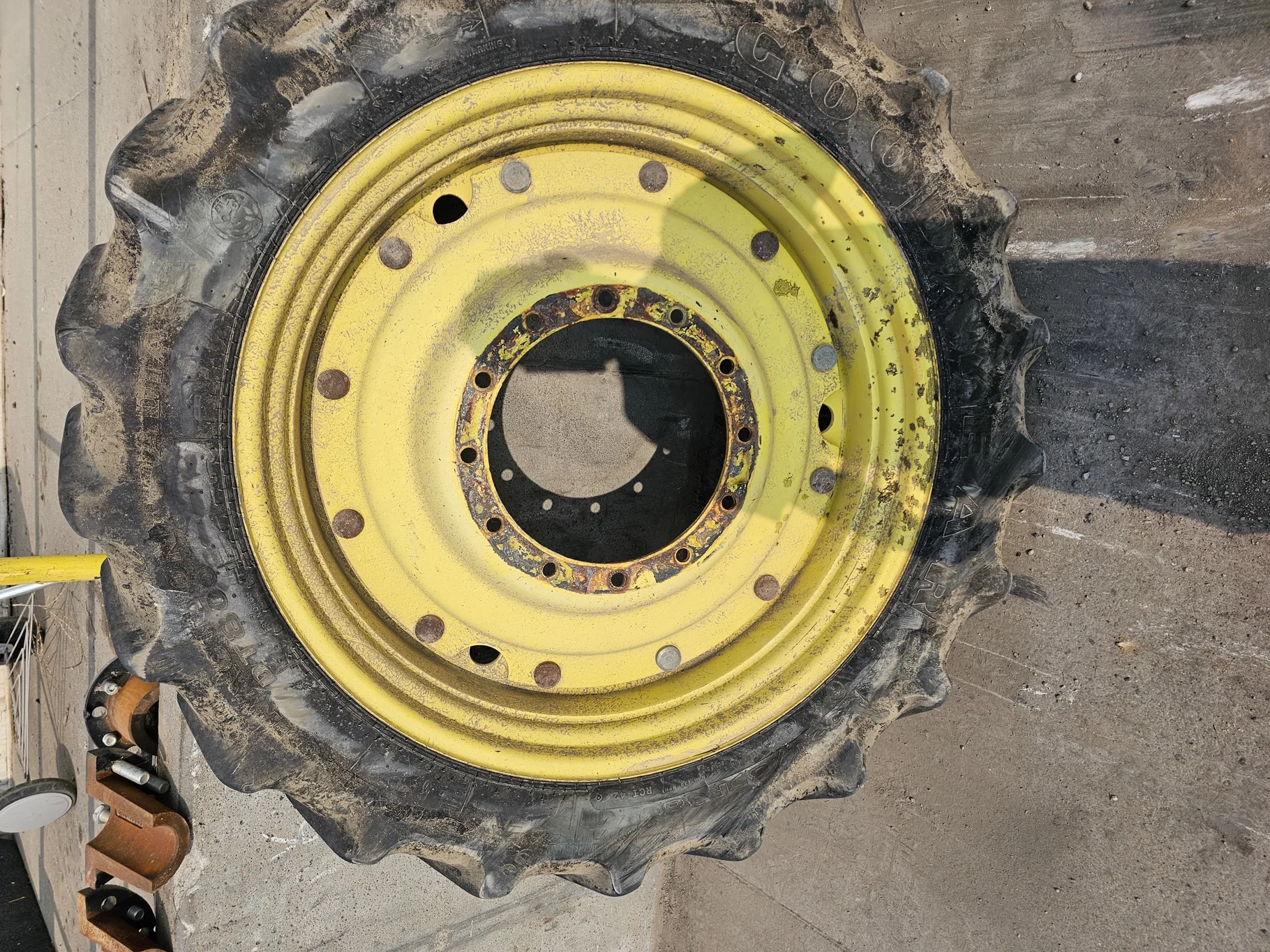 Used 45% 320/85R38 Goodyear Super Traction Radial  (142D) R-1W TL on a 10 x 38 John Deere Yellow St image 2