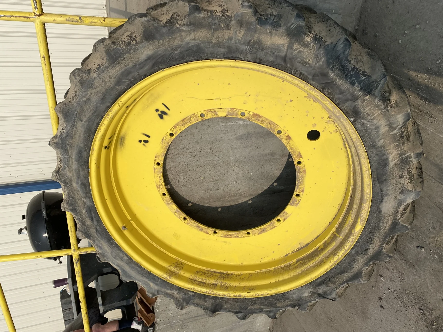 Used 40% 320/90R54 Goodyear Super Traction Radial (149A8) R-1W TL on a 10 x 54 JD Yellow Stub