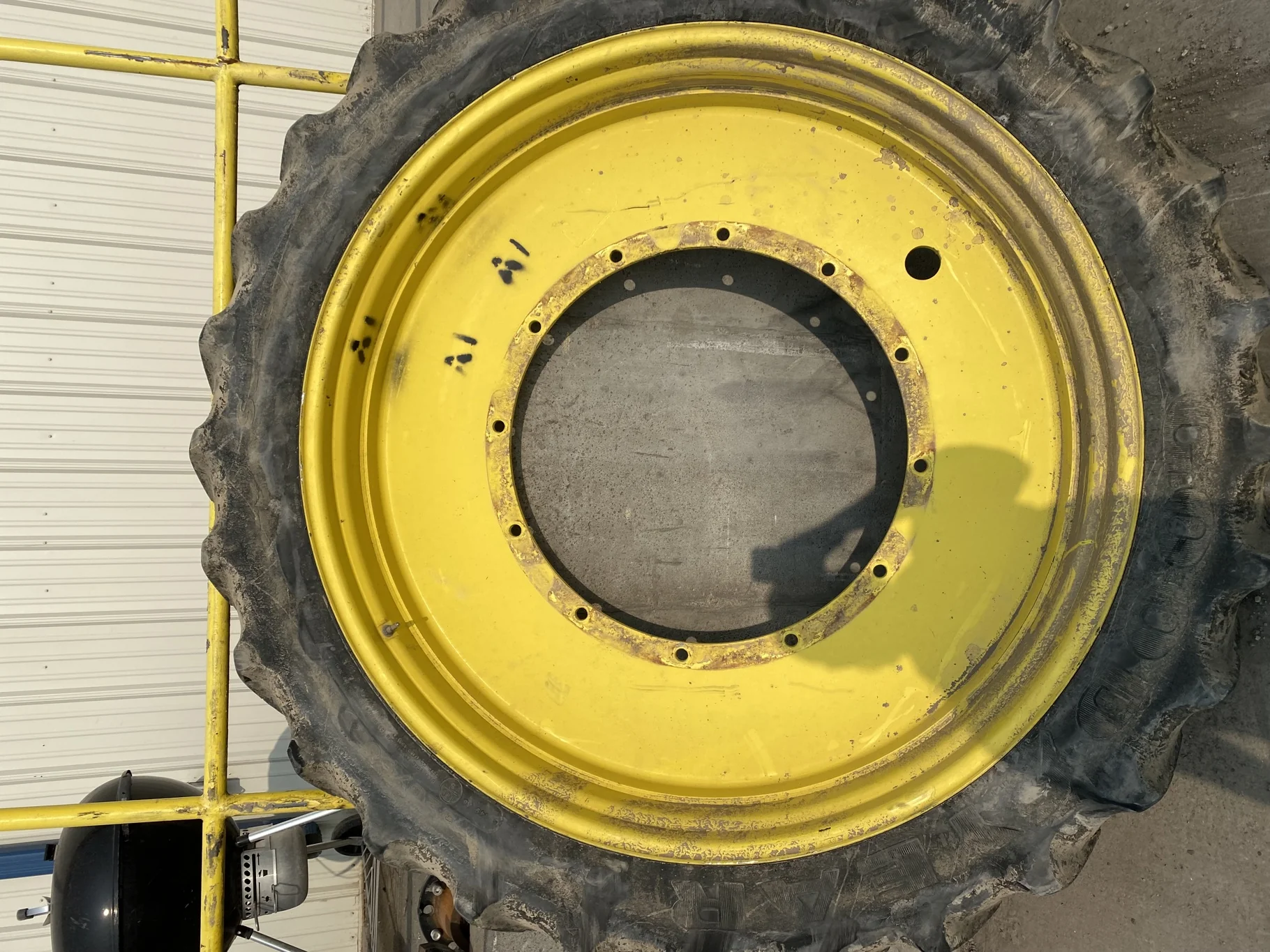 Used 40% 320/90R54 Goodyear Super Traction Radial (149A8) R-1W TL on a 10 x 54 JD Yellow Stub image 2