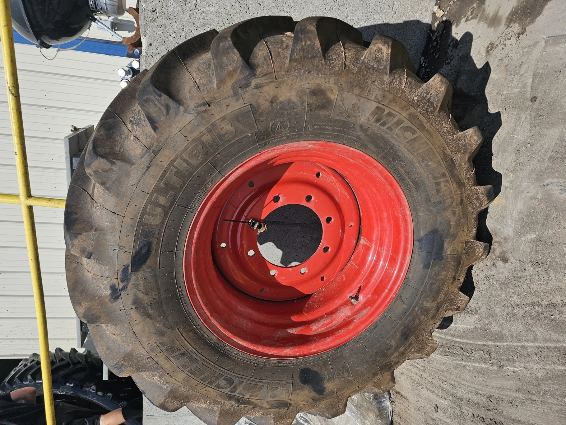 Take Off 480/65R24 Michelin MultiBib R-1W 133D TL on a 15 X 24 Fendt Red Formed 8 Bolt Wheel(27/32")