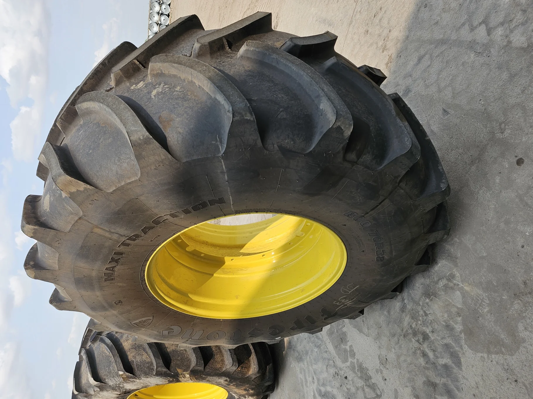Used 98% 800/70R38 Firestone Maxi Traction R-1W 173D TL on a 27 x 38 JD Stub Disc 12 Hole JD"55" Wh