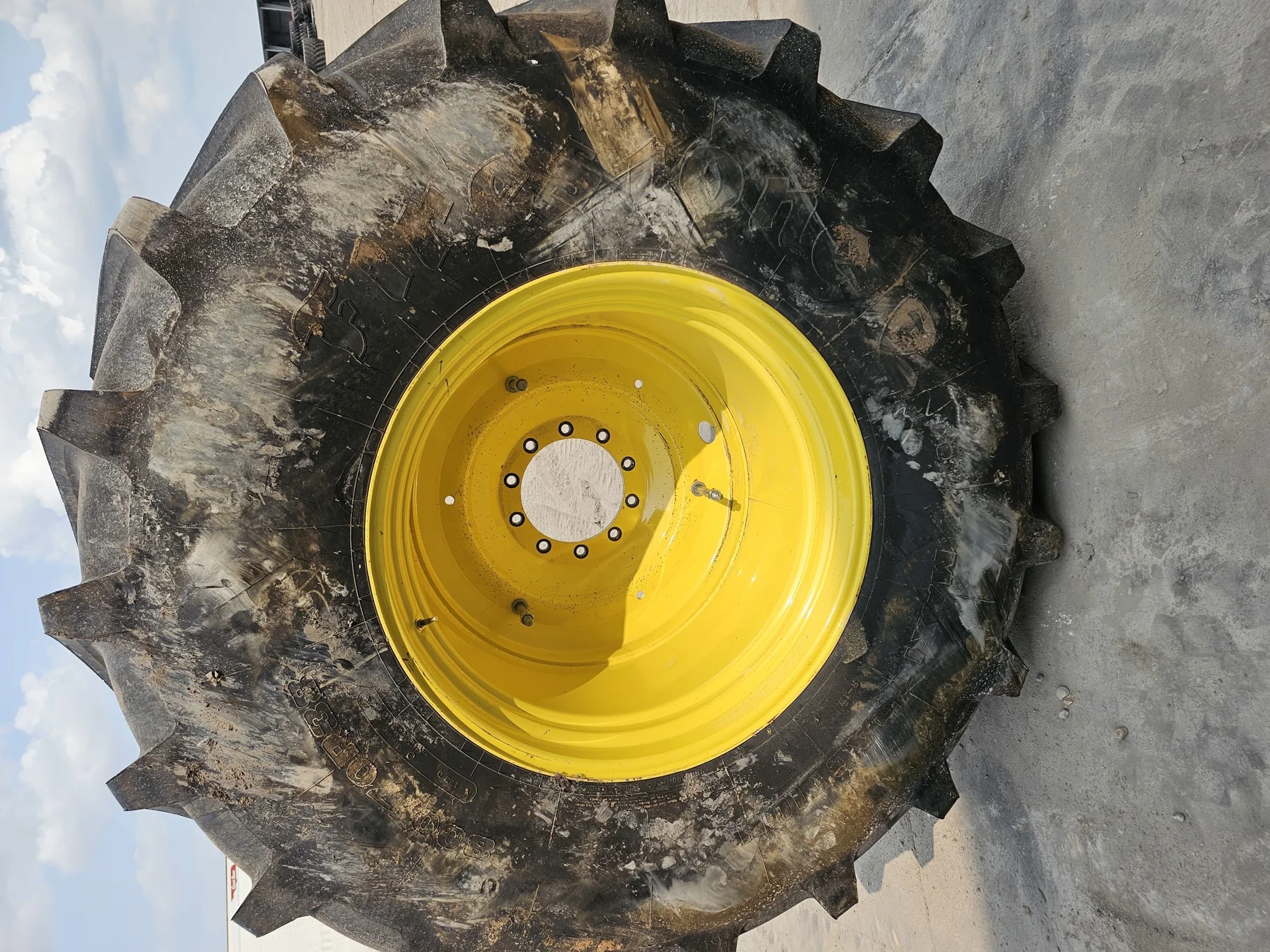 Used 98% 800/70R38 Firestone Maxi Traction R-1W 173D TL on a 25 x 38 JD Yellow 10 Bolt (.937)