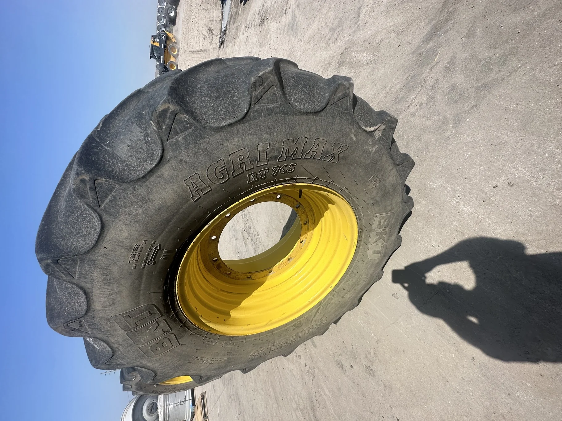 Used 35% 600/70R30 BKT Agrimax RT765 on 20 x 30 John Deere Yellow Large 12 Bolt Rim (Stubble, Uneven
