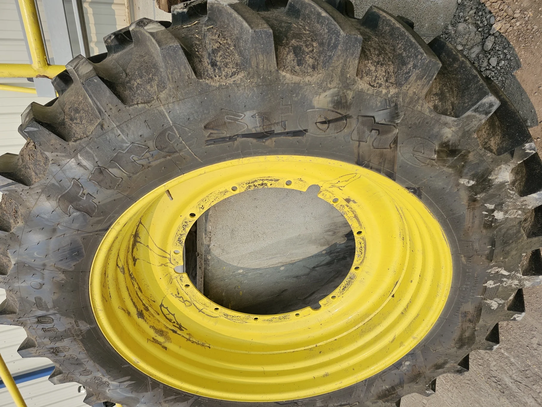 USED 95% 480/80R50 Firestone Radial Deep Tread 23 R-1W (159B) TL on a 15 X 50 JD Yellow 12 Bo