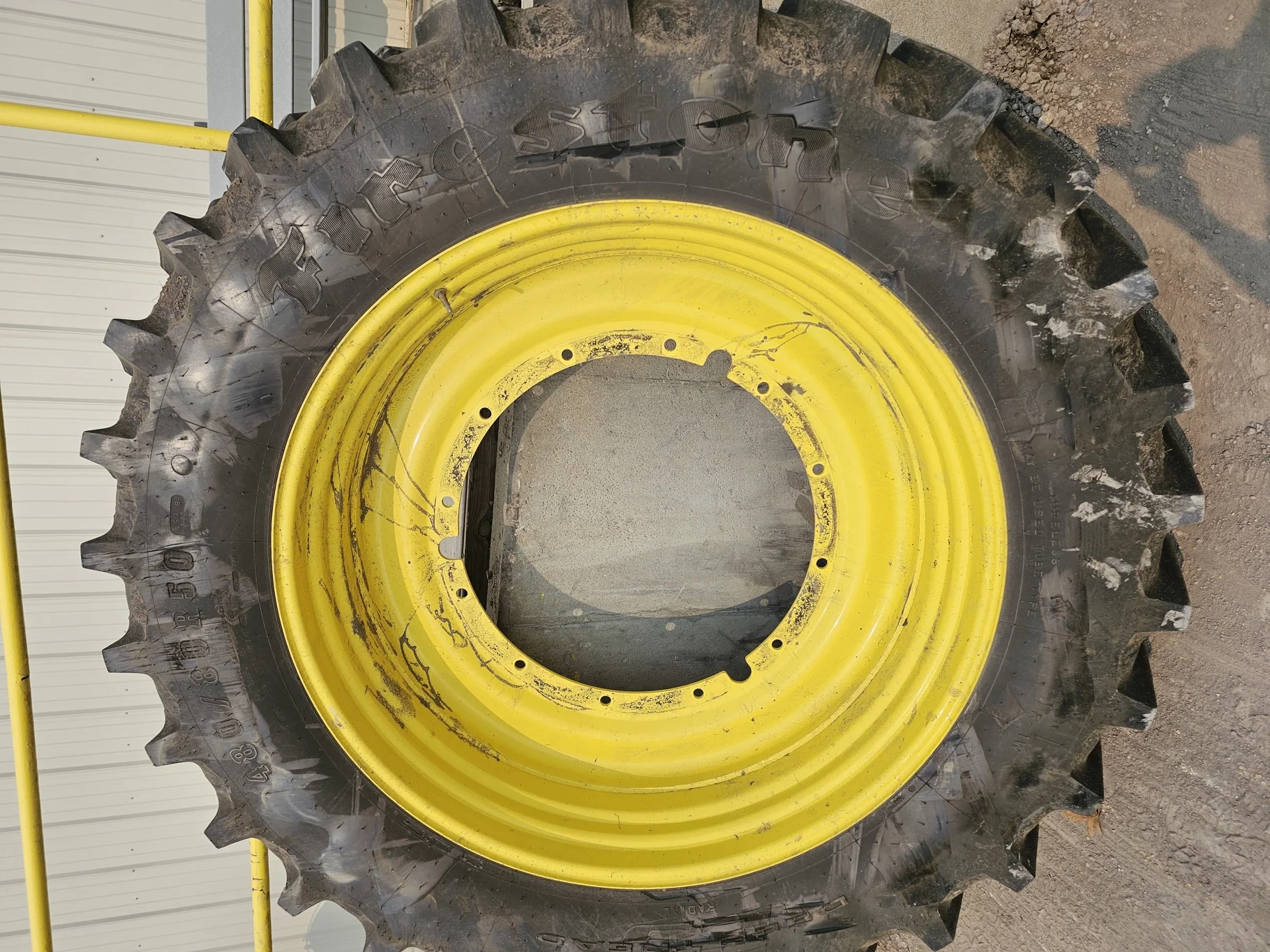 USED 95% 480/80R50 Firestone Radial Deep Tread 23 R-1W (159B) TL on a 15 X 50 JD Yellow 12 Bo image 2