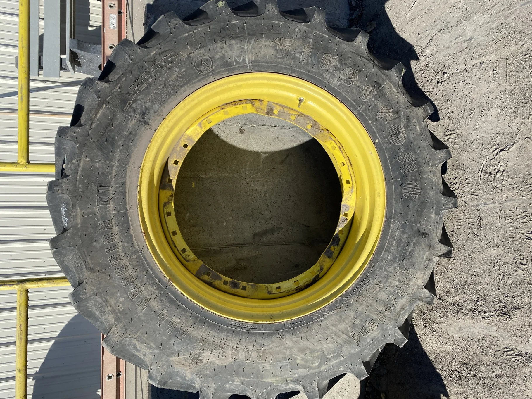 Take Off 420/85R34 Firestone Radial All Traction DT R-1W 147B TL on a 15 X 34 JD Yellow Waffle