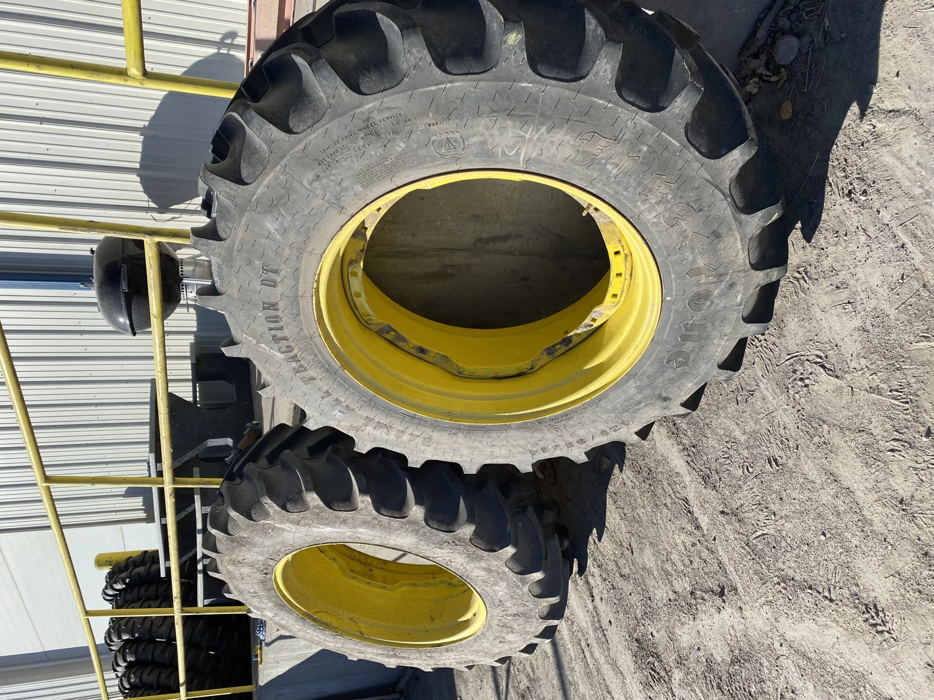 Take Off 420/85R34 Firestone Radial All Traction DT R-1W 147B TL on a 15 X 34 JD Yellow Waffle image 2