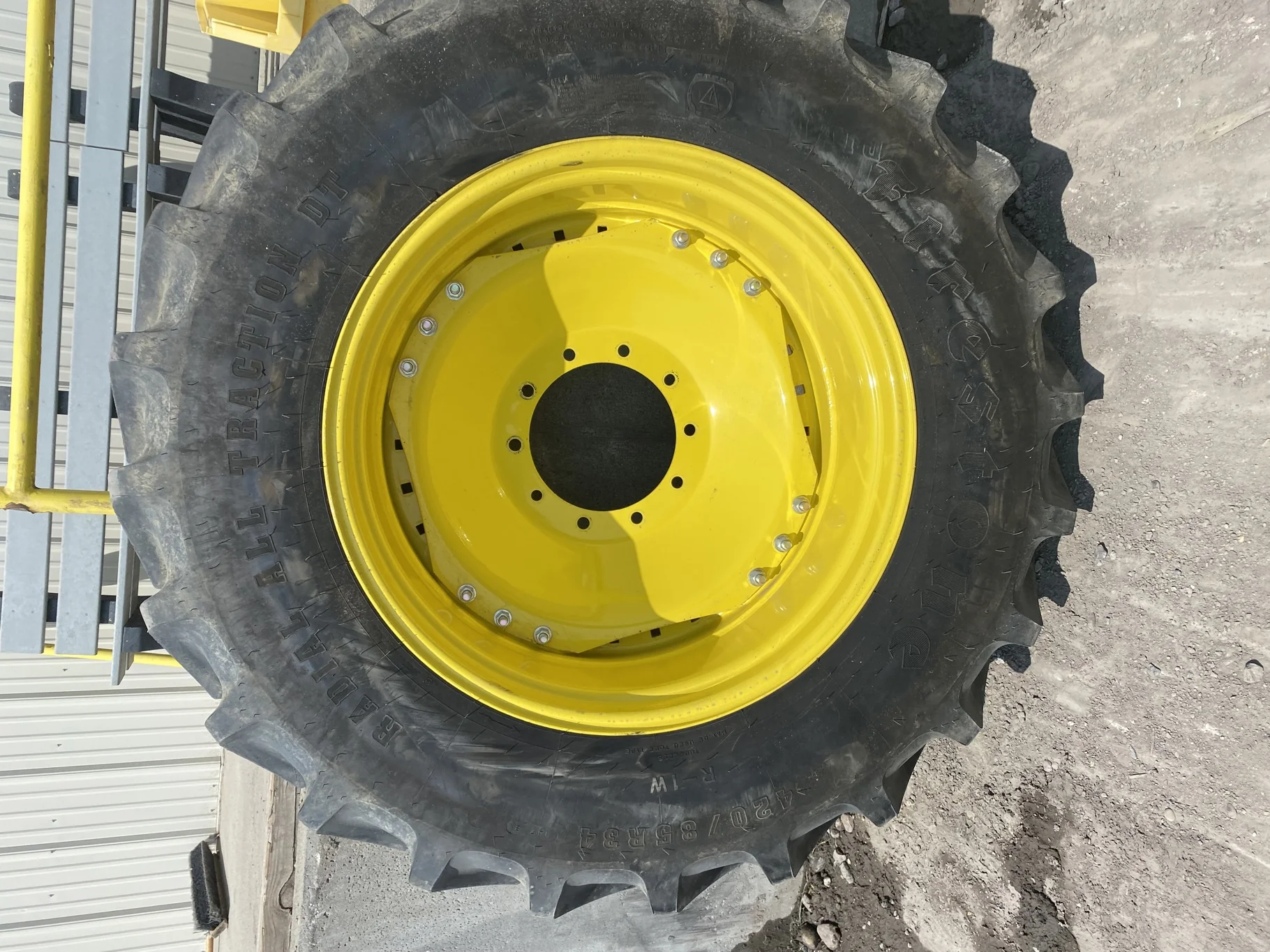 USED 98% 420/85R34 Firestone Radial All Traction DT R-1W 147B TL on a 15 X 34 JD Yellow Waffle image 2