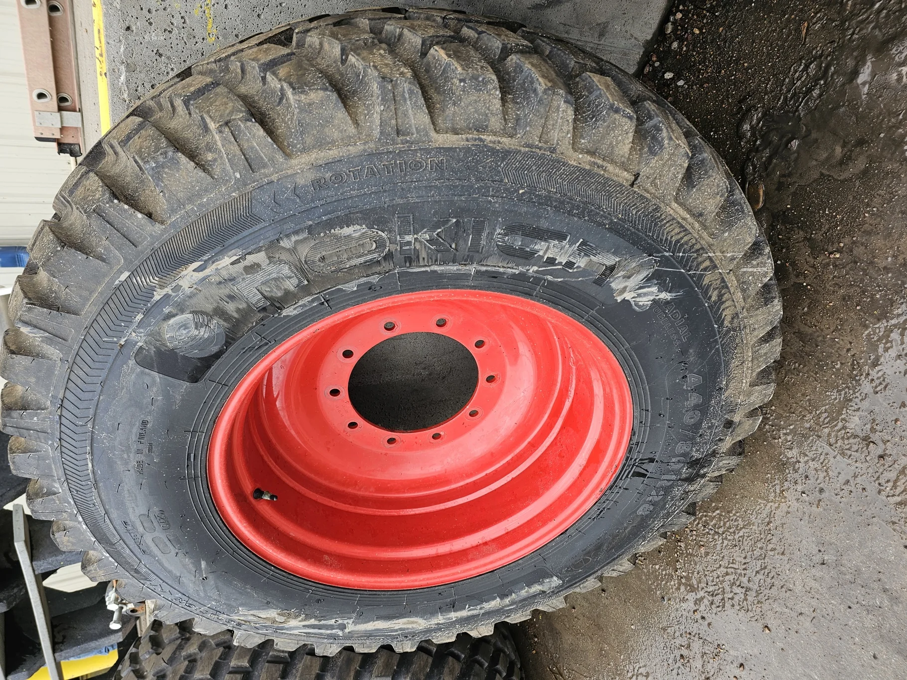 Used 90% 440/80R28 Nokian TRI-2 Steel Belted (156A8/151D) TL on a 15 x 28 10-13.19-11.07 Fendt Red