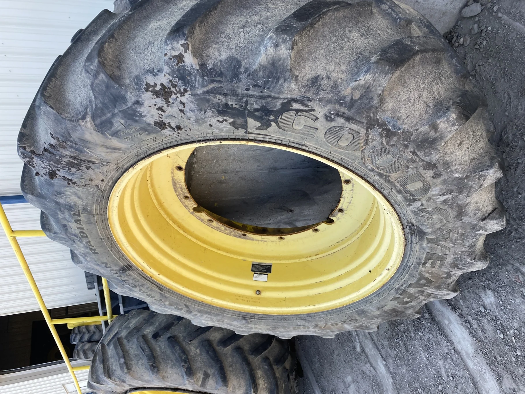 Used 60% 620/70R46 Goodyear Super Traction Radial DT820 (176A8) R-1W TL on a 21 x 46 JD Yellow