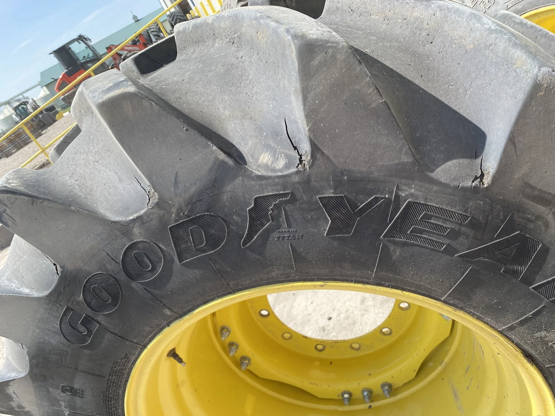 Used 85% LSW 710/60R30 Goodyear Super Traction Radial (177D) mounted on 25 x 30 JD Yellow 12 B image 9