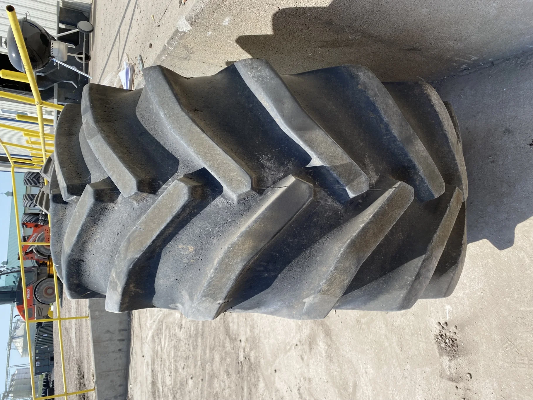 Used 85% LSW 710/60R30 Goodyear Super Traction Radial (177D) mounted on 25 x 30 JD Yellow 12 B image 3