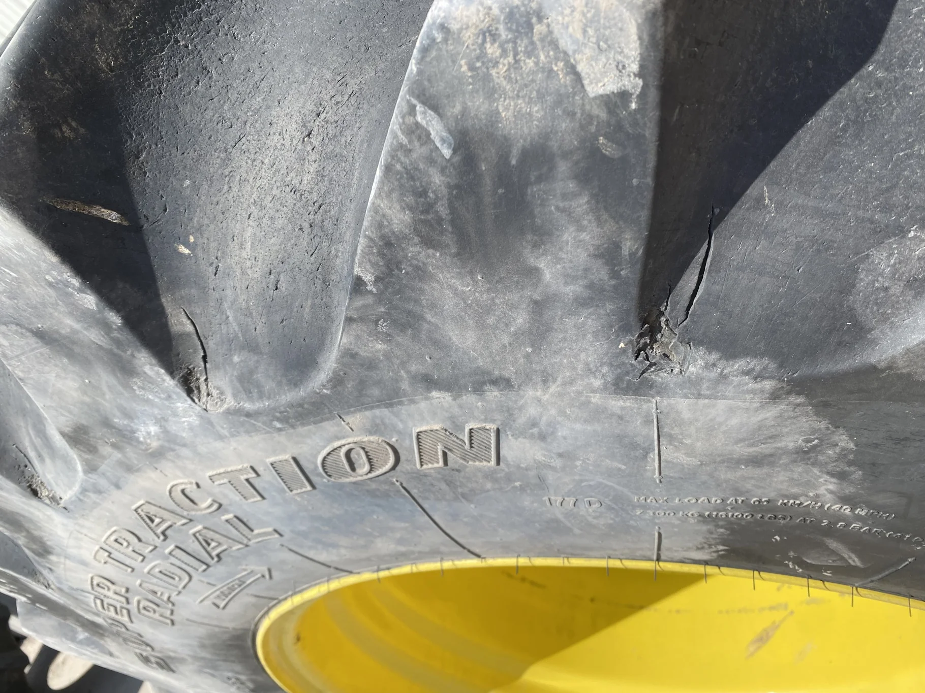 Used 85% LSW 710/60R30 Goodyear Super Traction Radial (177D) mounted on 25 x 30 JD Yellow 12 B image 5