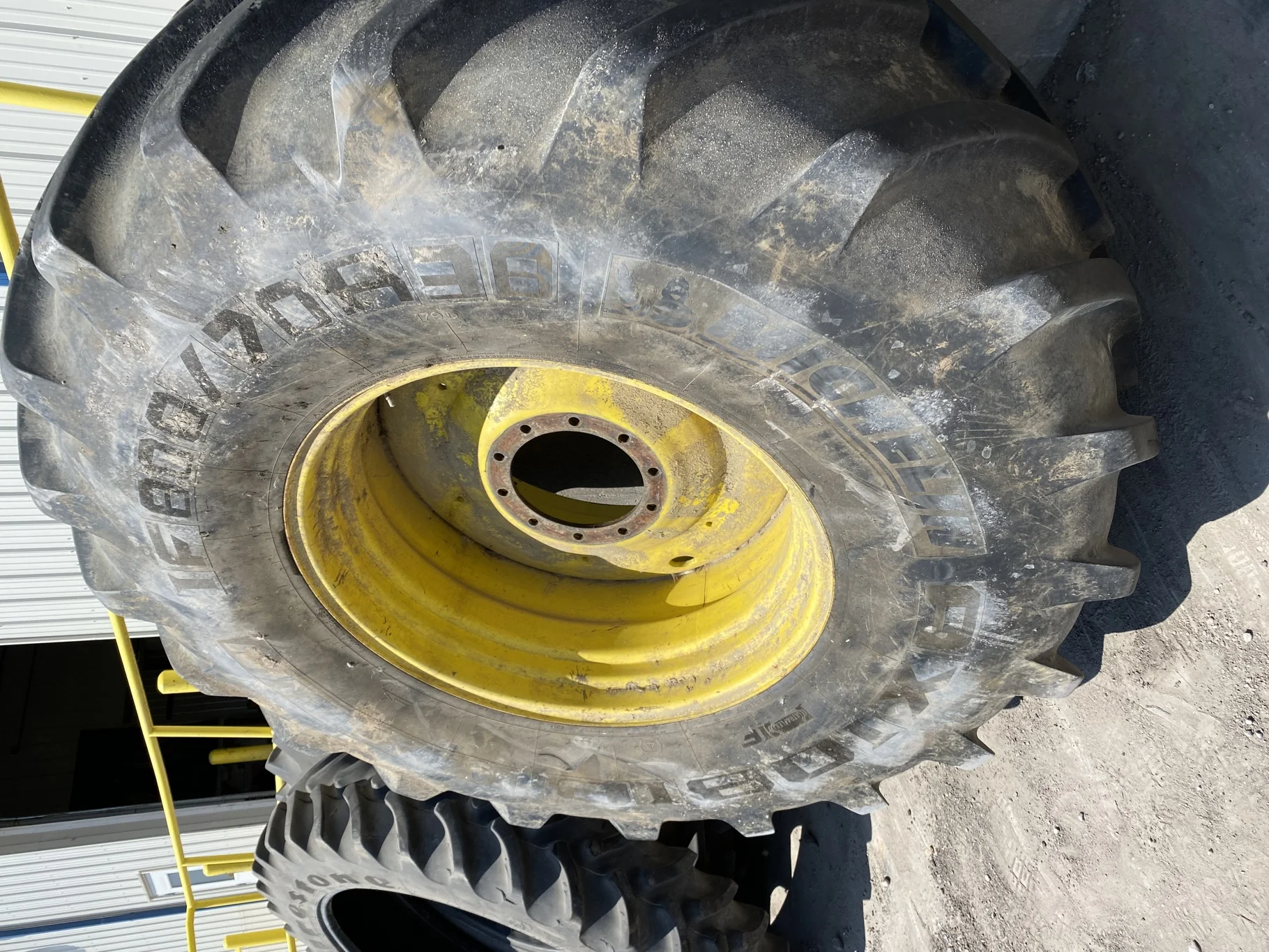 Used 85% IF800/70R38 Michelin AxioBib R-1W 179D TL on a 25 x 38 JD Yellow 10 Bolt Dual Wheel -