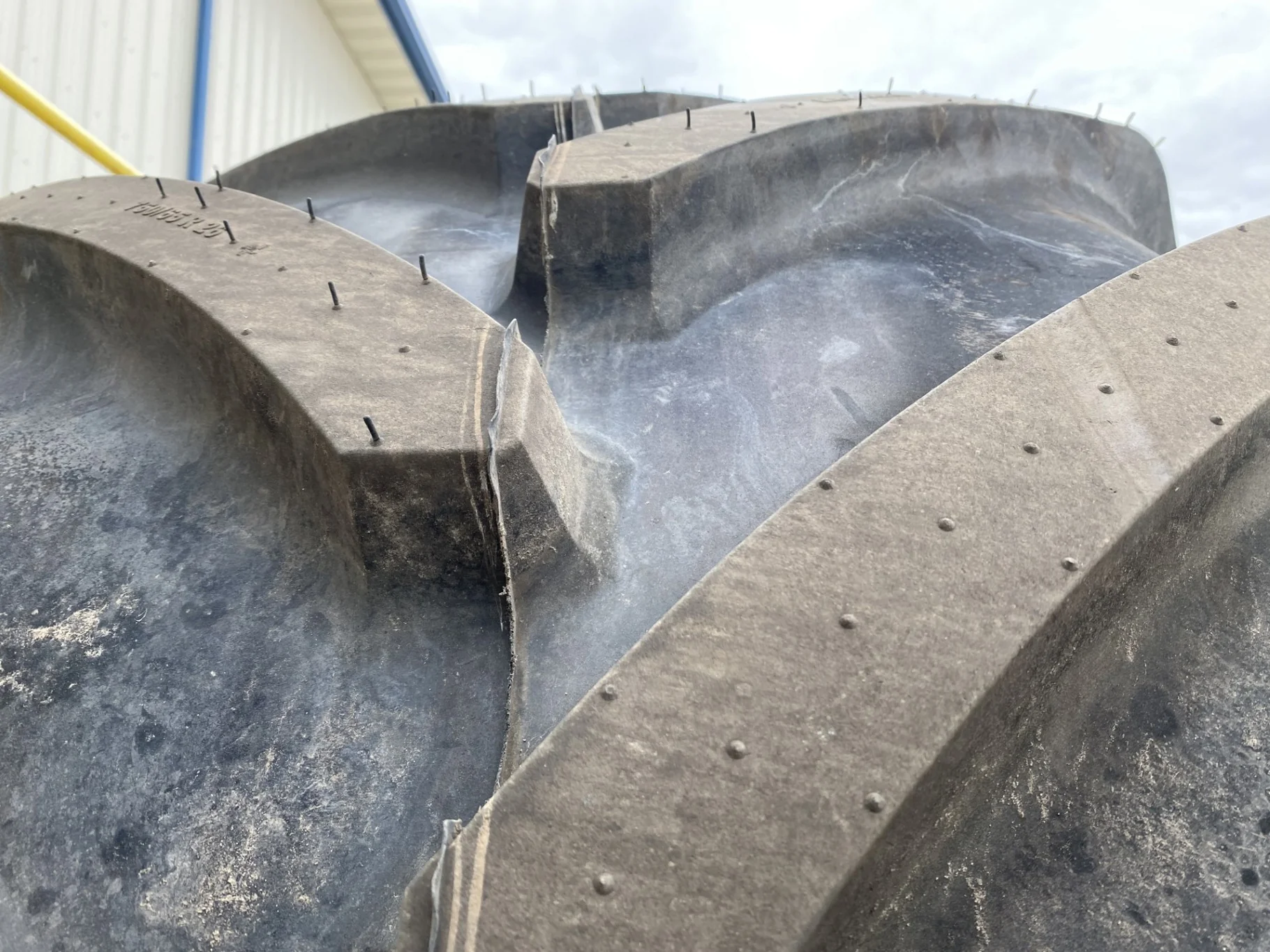 Used 95% 750/65R26 Michelin MegaXbib R-1W 171A8/171B TL on a 25 X 26 CIH Silver 10 Bolt Rear image 8