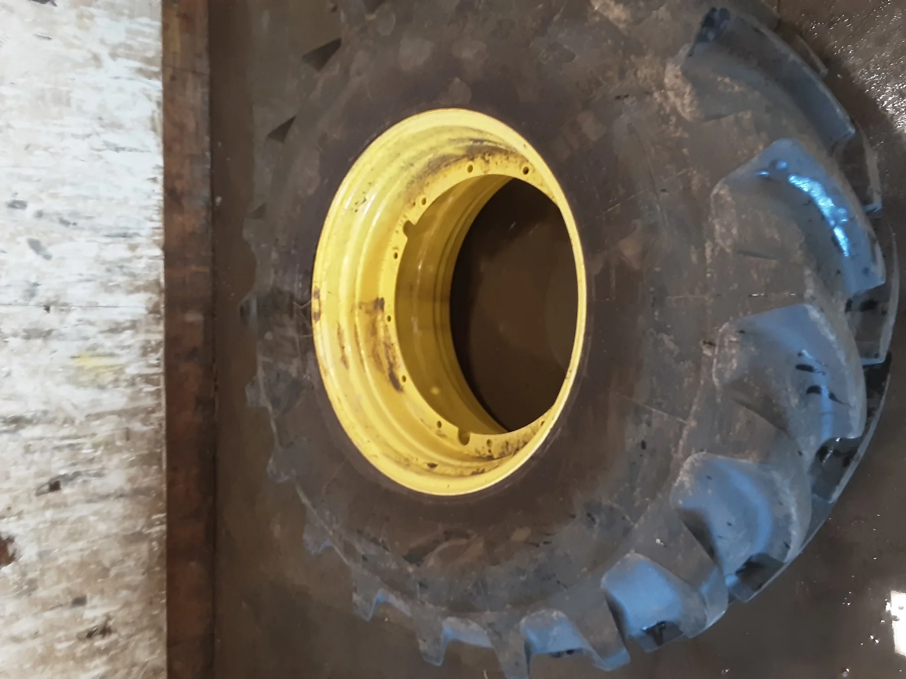 Used 95% 650/85R38 Michelin MachXBib R-1W 173A8/173B TL on a 23 x 38 JD Yellow 12 Bolt (.937) image 2