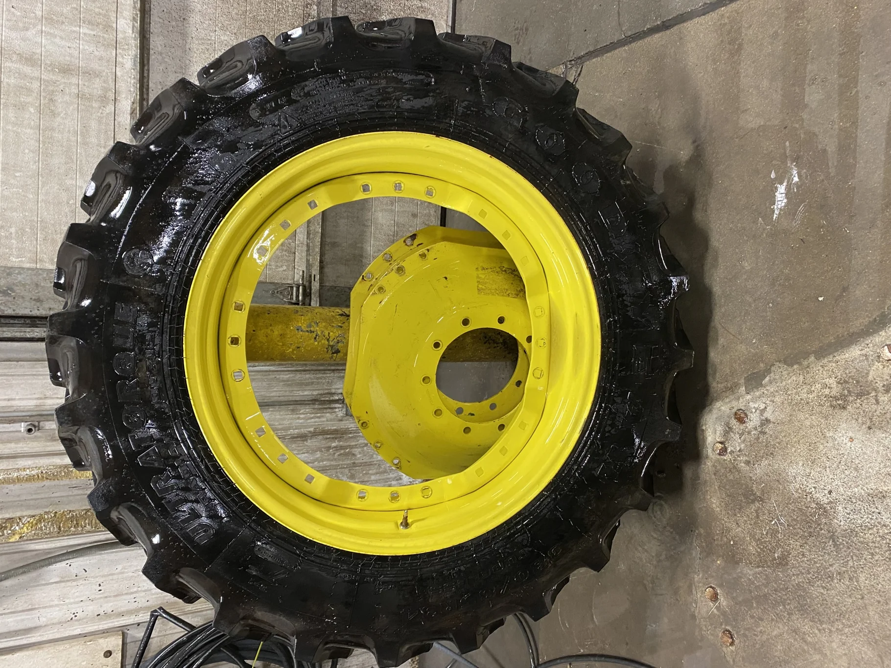 Used 85% 380/85R34 Goodyear Ultratorqe DT712 R-1 (137D) TL on a 13 x 34 JD Yellow Waffle Wheel