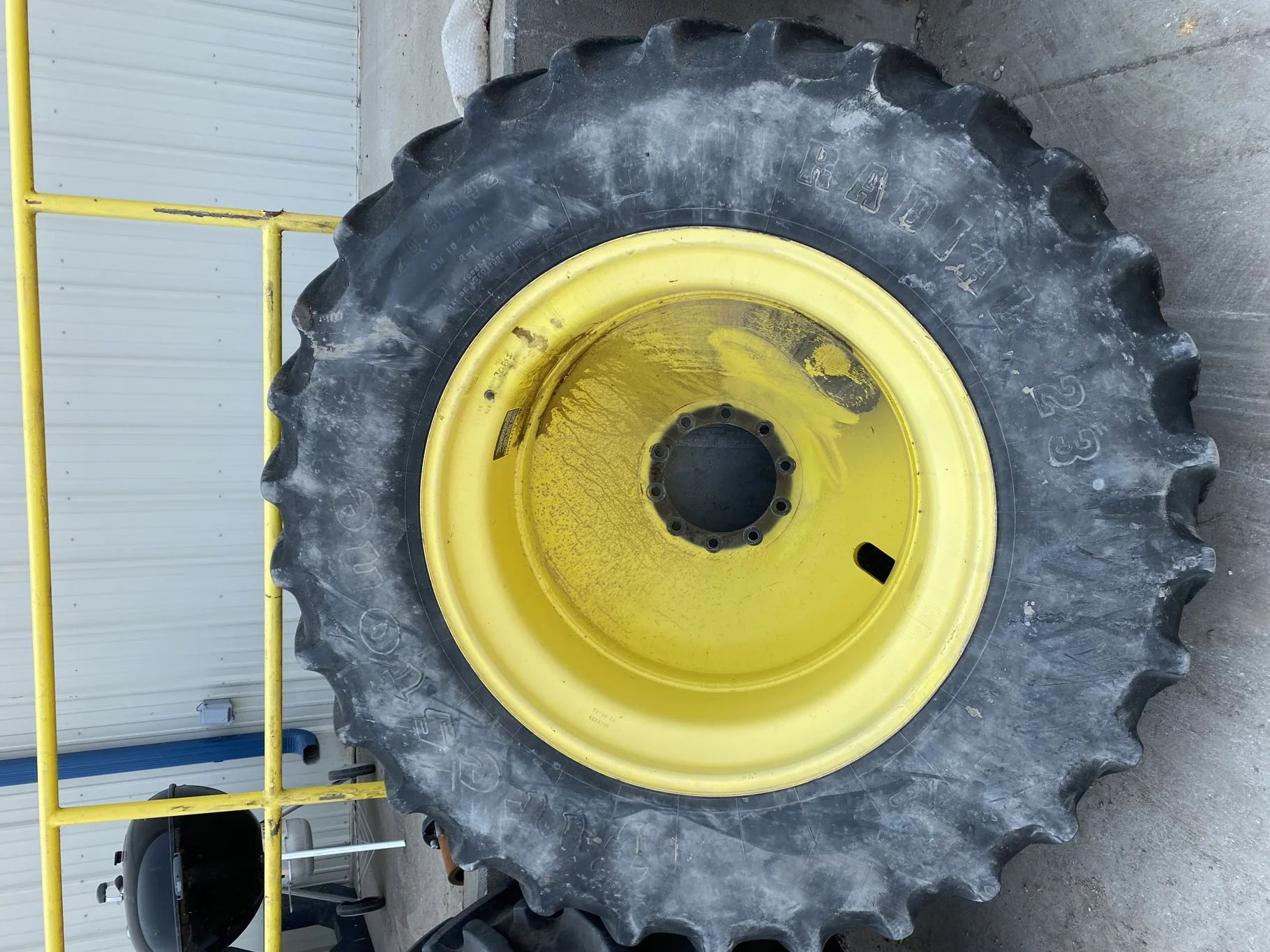 Used 55% 20.8R42 Firestone 23 on a 18 x 42 JD Yellow 10 Bolt Outside Dolly Dual   (Stubble, We