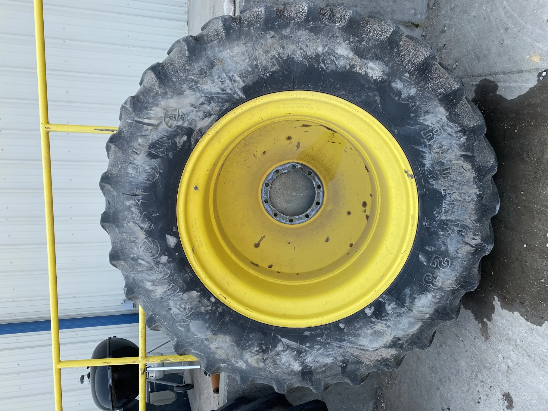 Used 55% 20.8R42 Firestone 23 on a 18 x 42 JD Yellow 10 Bolt Inside Dolly Dual   (Lug Cuts, We