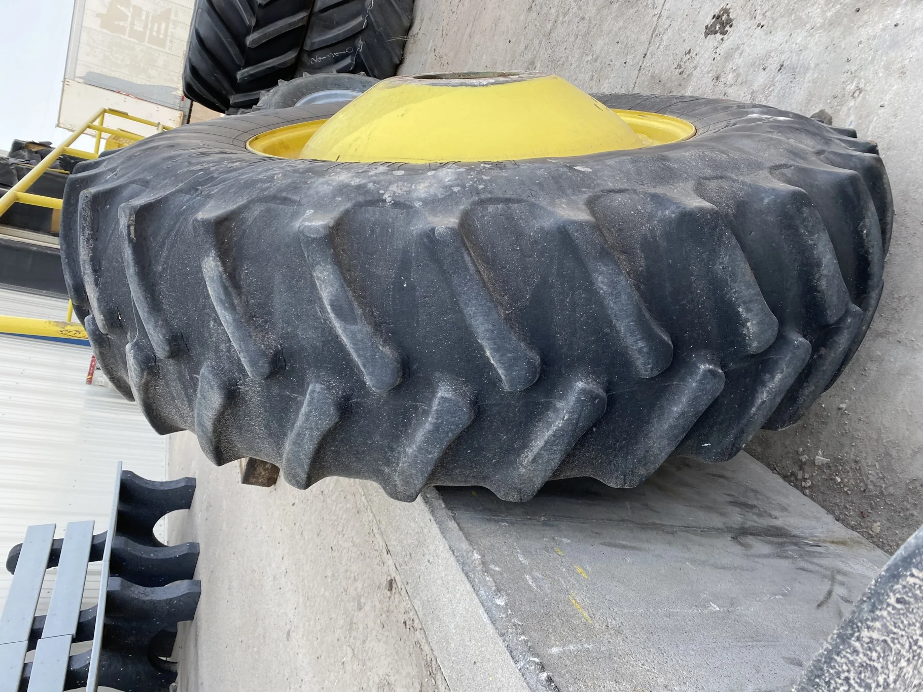 Used 55% 20.8R42 Firestone 23 on a 18 x 42 JD Yellow 10 Bolt Inside Dolly Dual   (Lug Cuts, We image 4