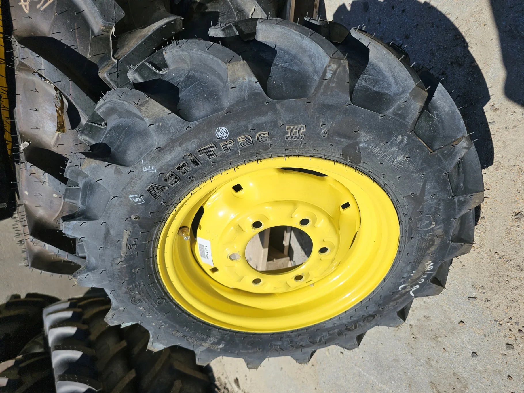 Take Off 180/95-14 Galaxy Agri Trac II R-1 (97A6) TL on a 6 X 14 JD Yellow 6 Bolt (.625) Wheel