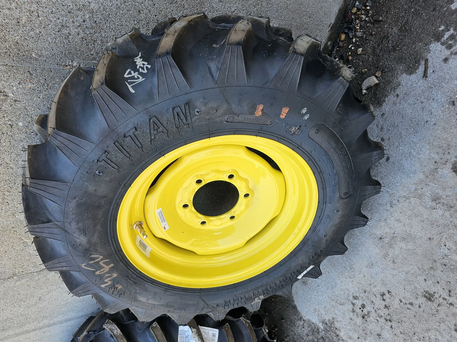 Take-Off 8-16/6 Titan Hi-Traction TL R-1 on 6 X 16 6-6-4.625 Implement JD Yellow Wheel (Assembly)