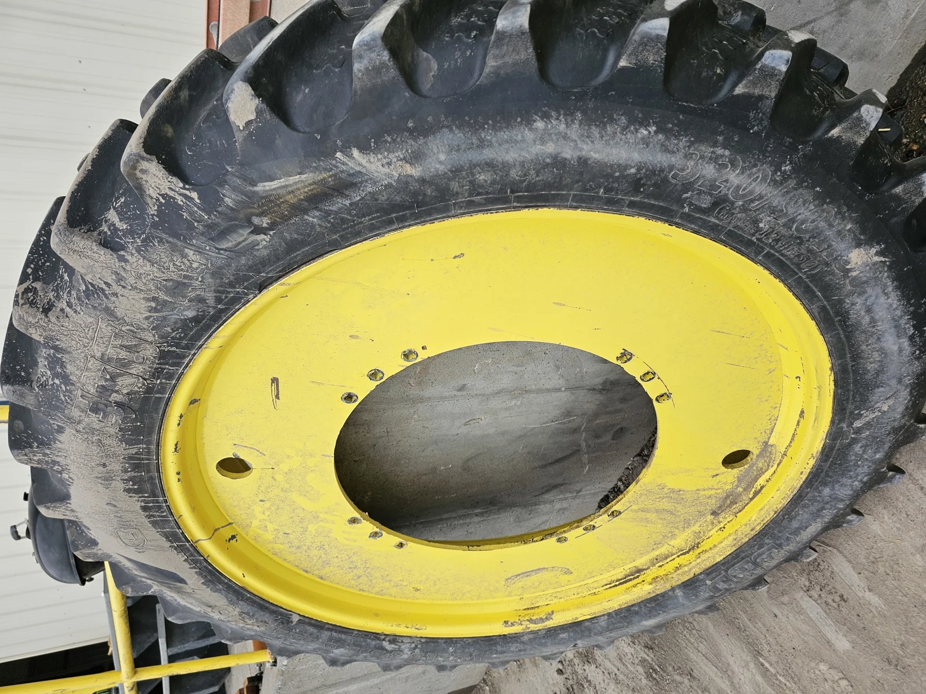 Used 80% 320/90R50 (12.4R50) BKT Agrimax RT945 R-1 150A8 TL on a 10 x 50 JD Yellow Pronar 2 Pi