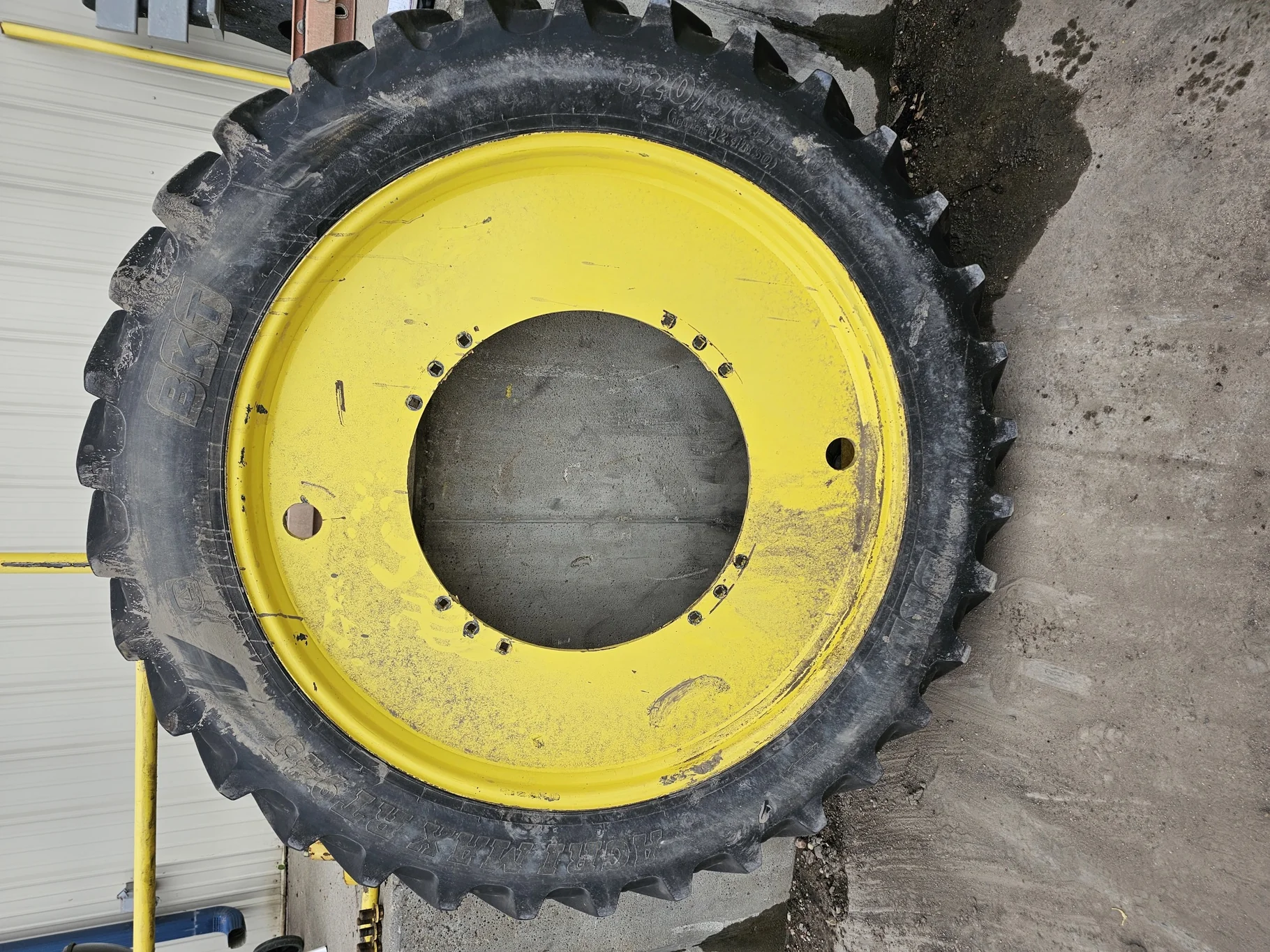 Used 80% 320/90R50 (12.4R50) BKT Agrimax RT945 R-1 150A8 TL on a 10 x 50 JD Yellow Pronar 2 Pi image 2