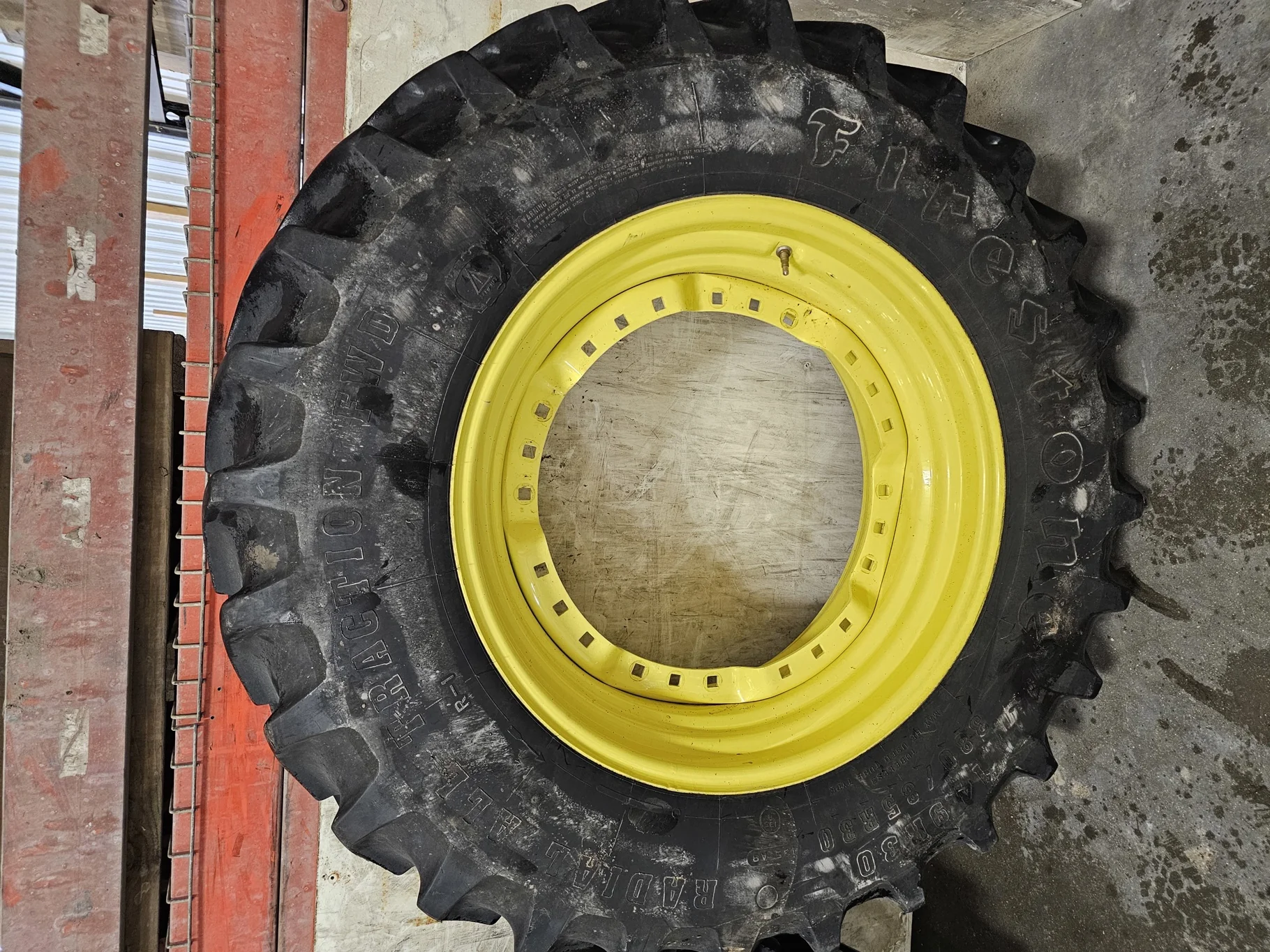 Used 60% 380/85R30 Firestone Radial All Traction FWD R-1 (135B) TL on a 13 x 30 JD Yellow (3 B image 2