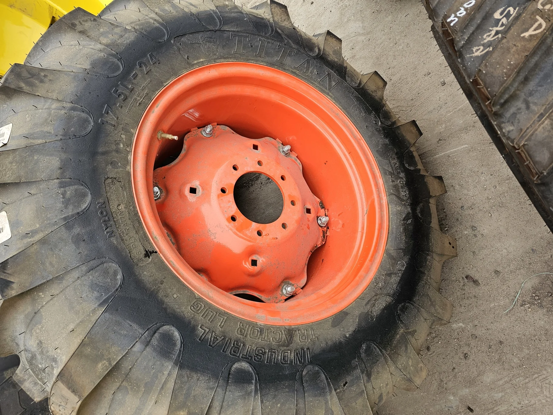 Take Off 17.5L-24 Titan Industrial Tractor Lug R-4 D(8Ply) TL on a 15 X 24 Kubota Orange 6 Loop Whee image 4
