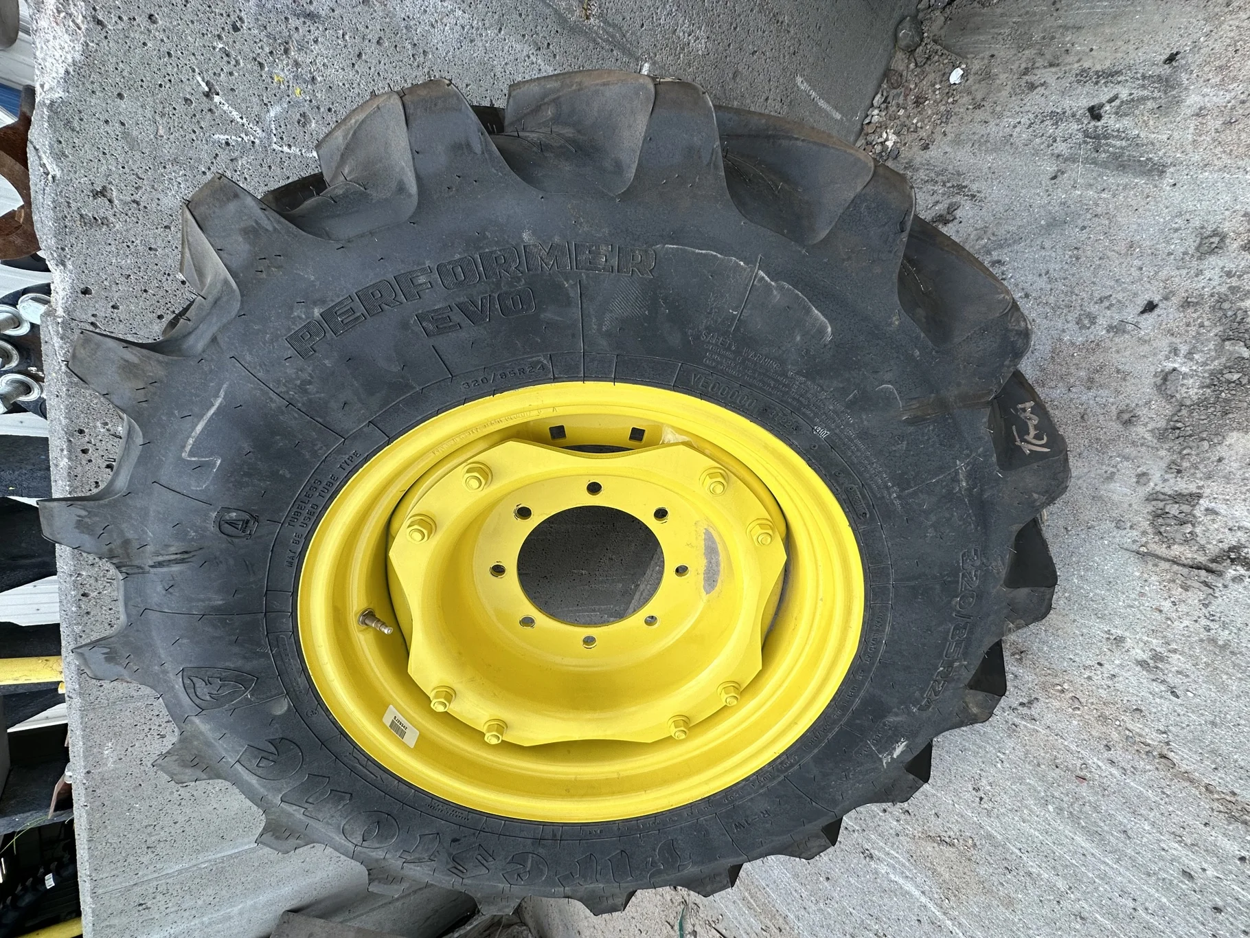 Take Off 320/85R24 Firestone Performer EVO R-1W 122D TL on a 10 X 24 John Deere Yellow Waffle Wheel