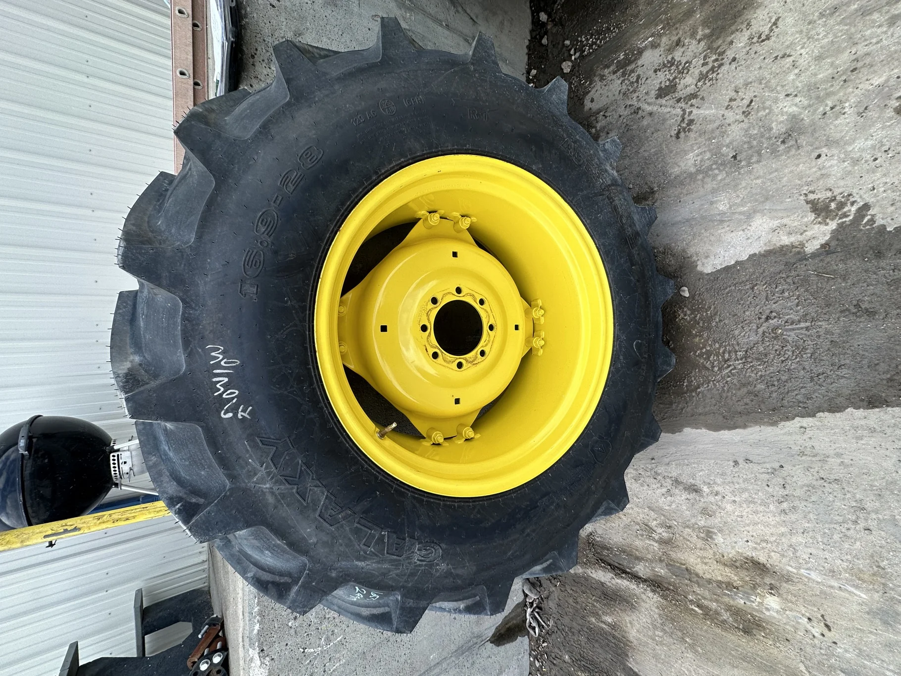 Take Off 16.9-28 Galaxy Agritrac 2 R-1 D(6Ply) TL on a 15 X 28 JD GKN Wheel (2 Bolt) with a 28/30" image 2