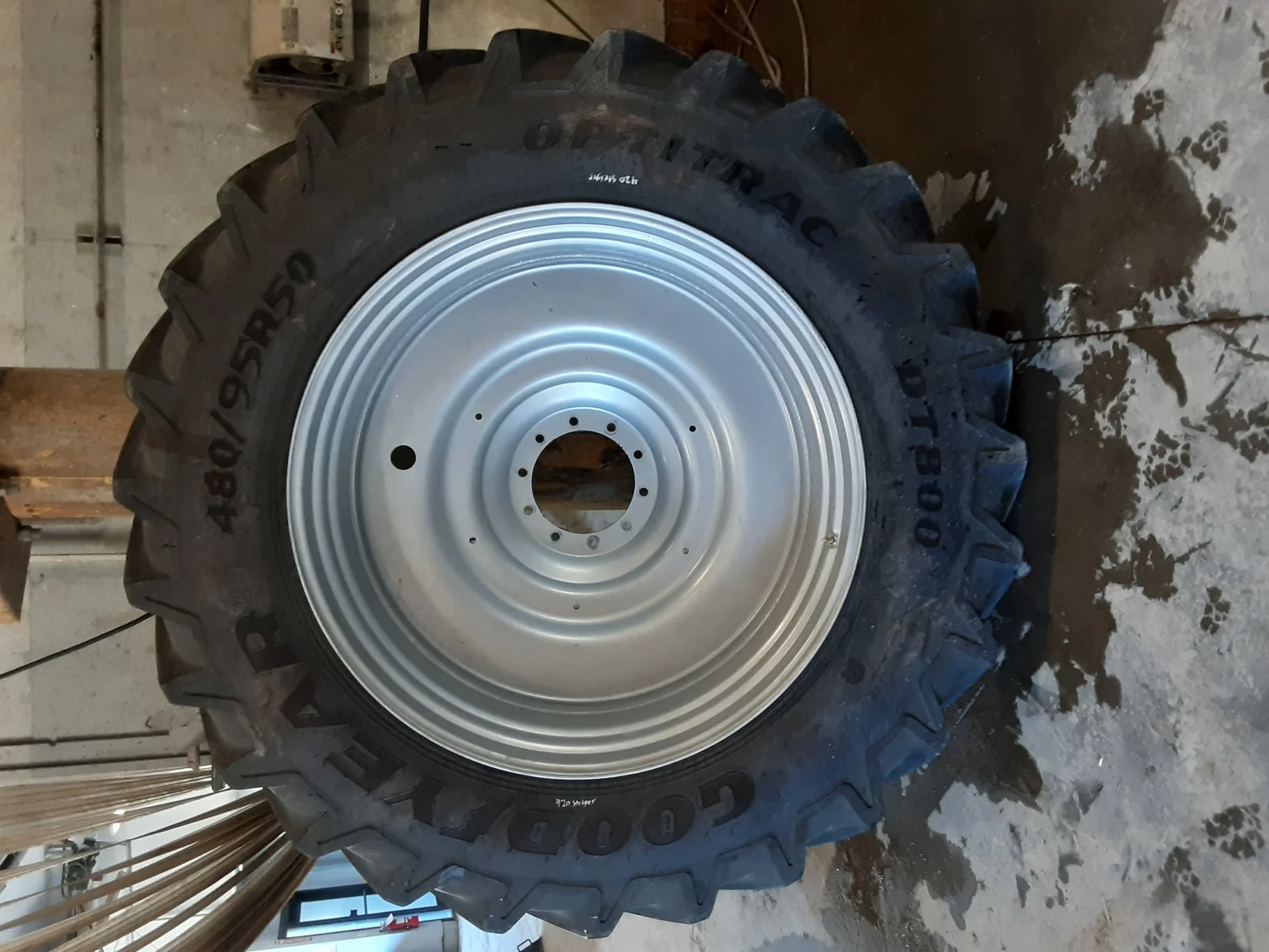 Used 95% 480/95R50 Goodyear Optitrac DT800 164B R-1W TL on a 15 x 50 Case Silver 10 Bolt Dual Wheel