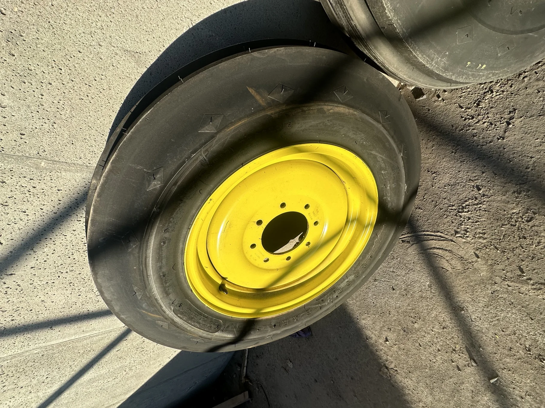 Take Off 7.50-20/8 Goodyear Super 3 Rib F-2 TL on a 5.5 x 20 8-8-6.0 JD Yellow Implement