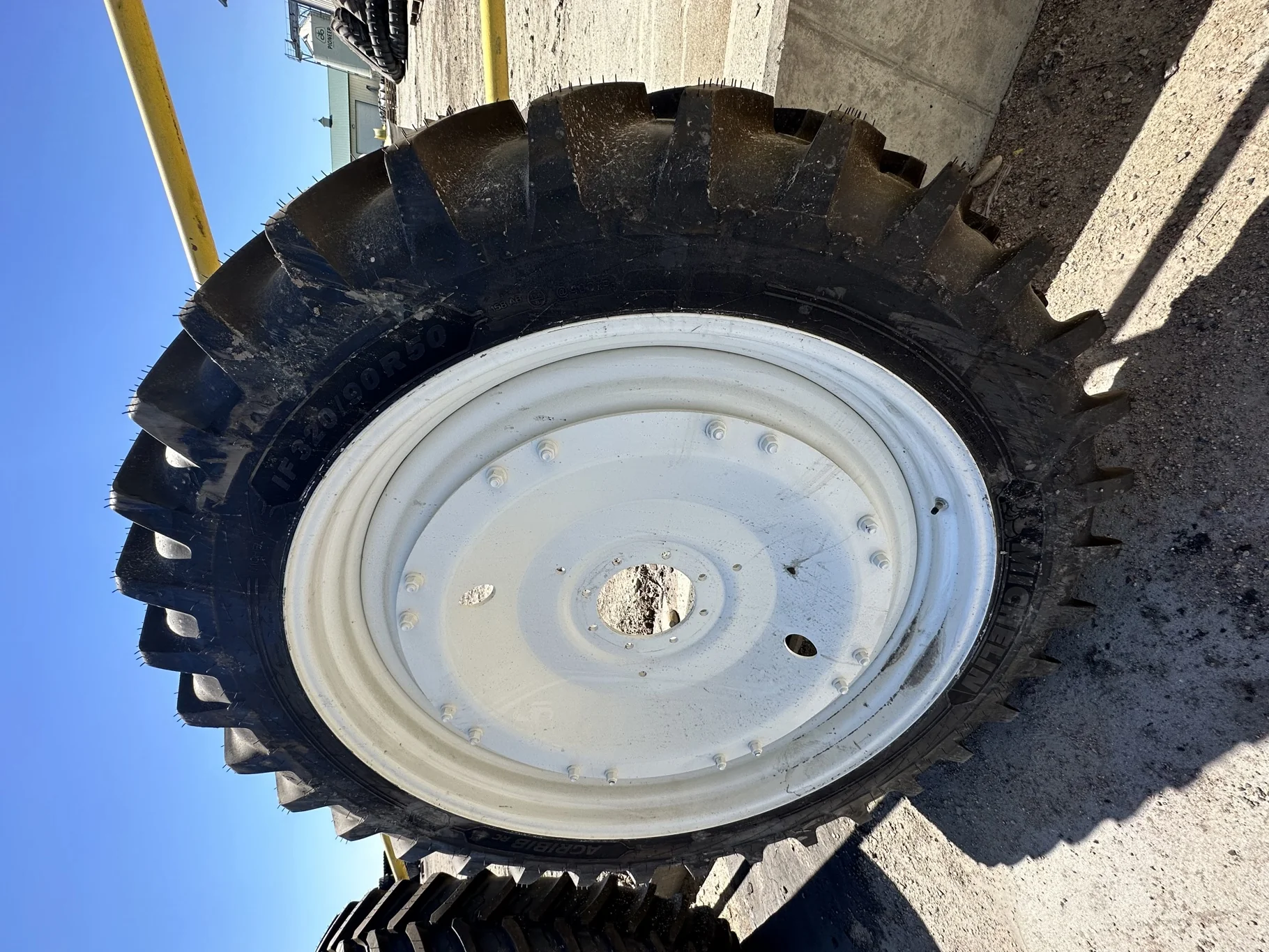 Take Off IF320/90R50 Michelin AgriBib Row Crop 158B TL on a 10 X 50 NH White 8 Bolt Waffle Wheel