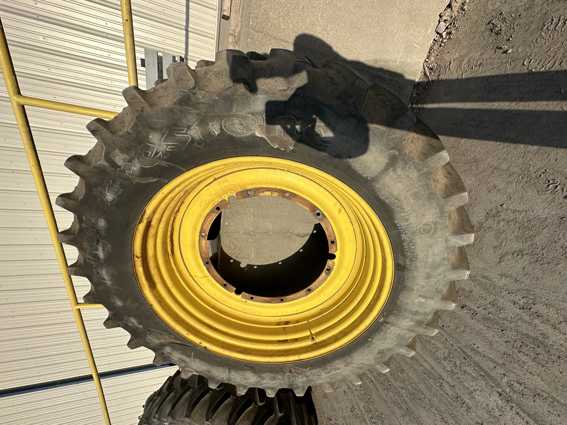 Used 75% 480/80R50 Firestone Radial Deep Tread 23 R-1W 159B TL on 15 x 50 John Deere Yellow 12 Bolt