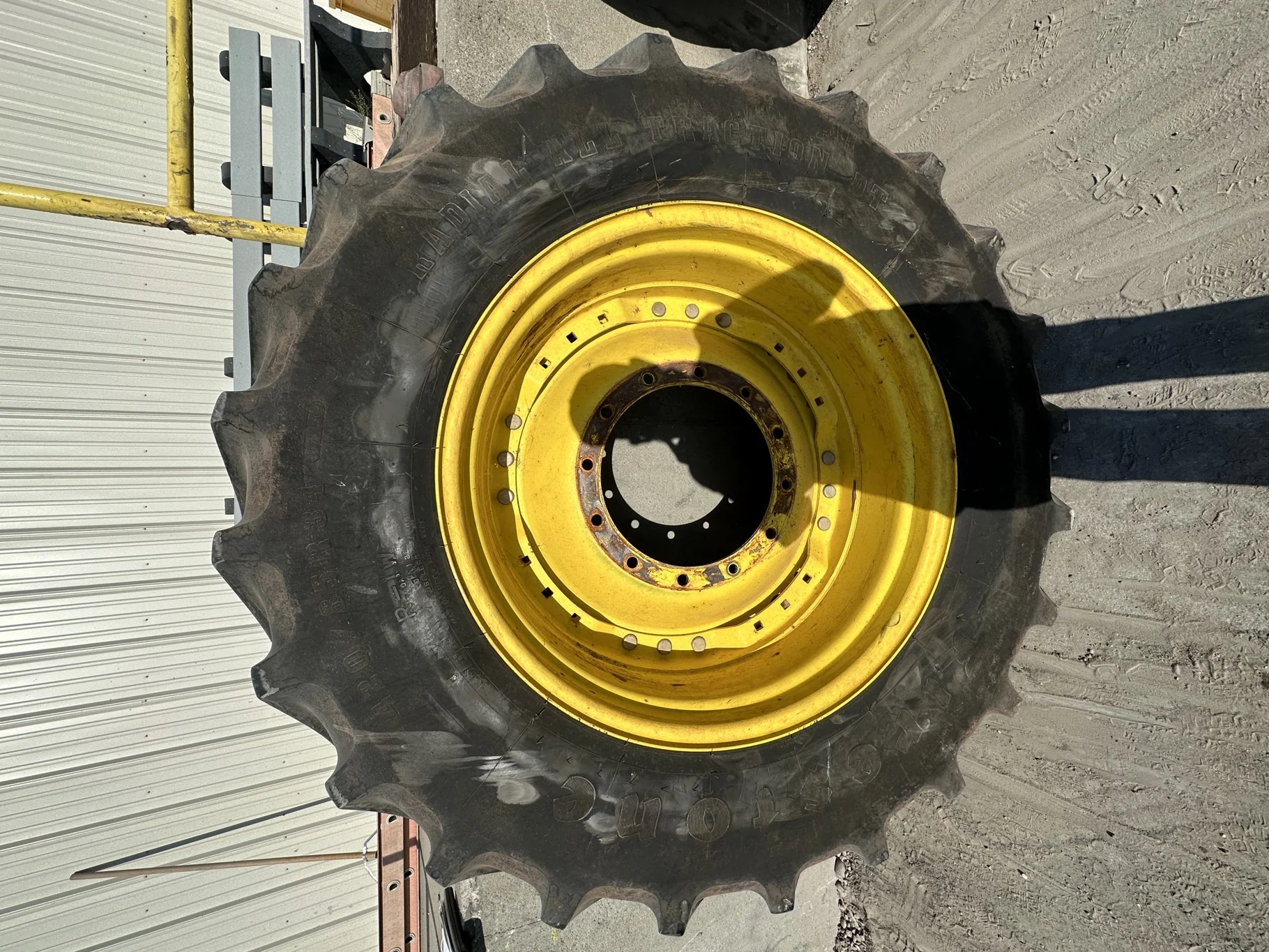 Used 70% 420/85R34 Firestone Radial All Traction DT R-1W 147B TL on a 15 x 34 JD Yellow Waffle image 2