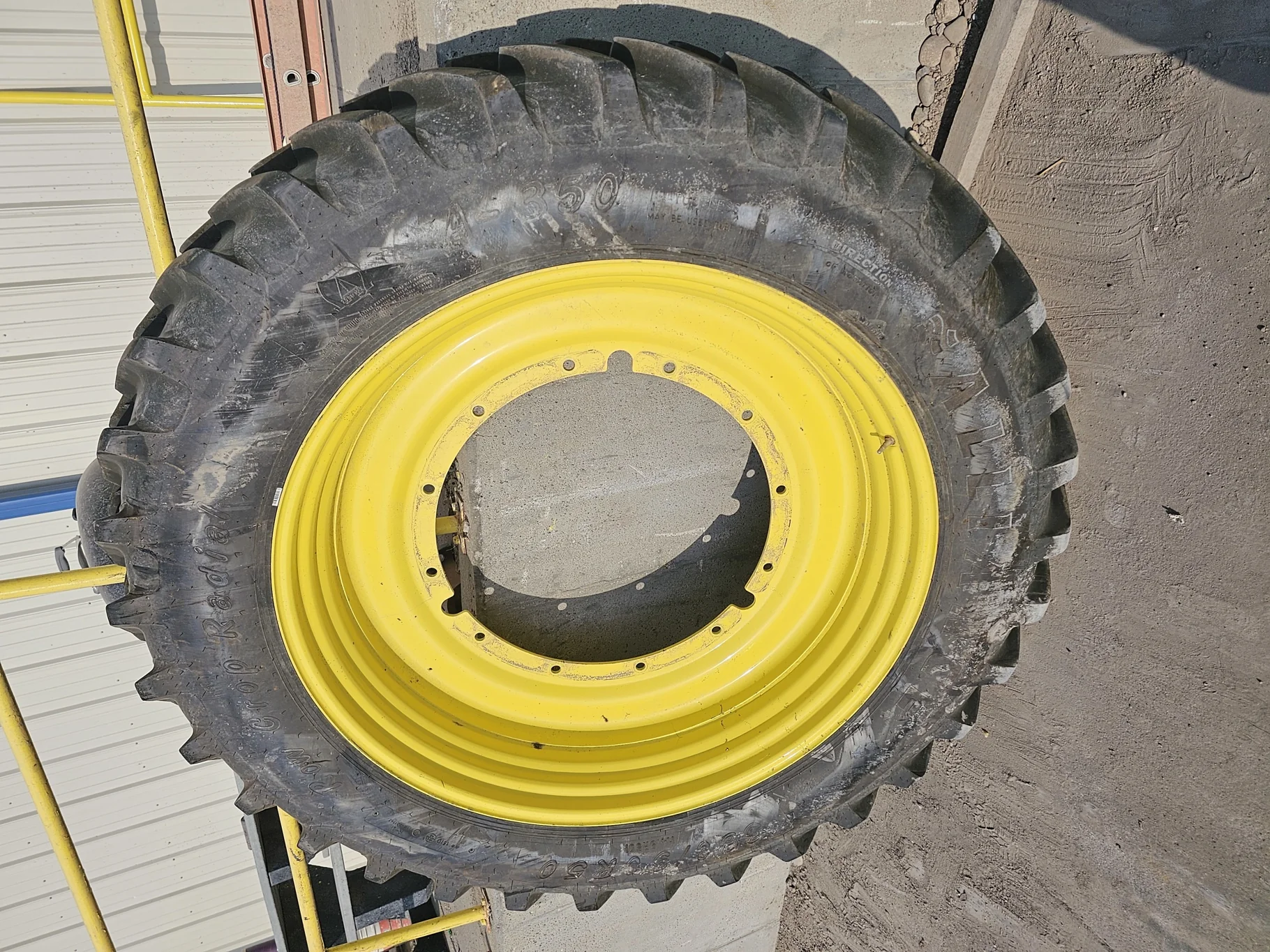 Used 80% 380/90R50 (14.9R0) Alliance Row Crop Radial R-1W 151D TL on a 12 x 50 JD Yellow Stub