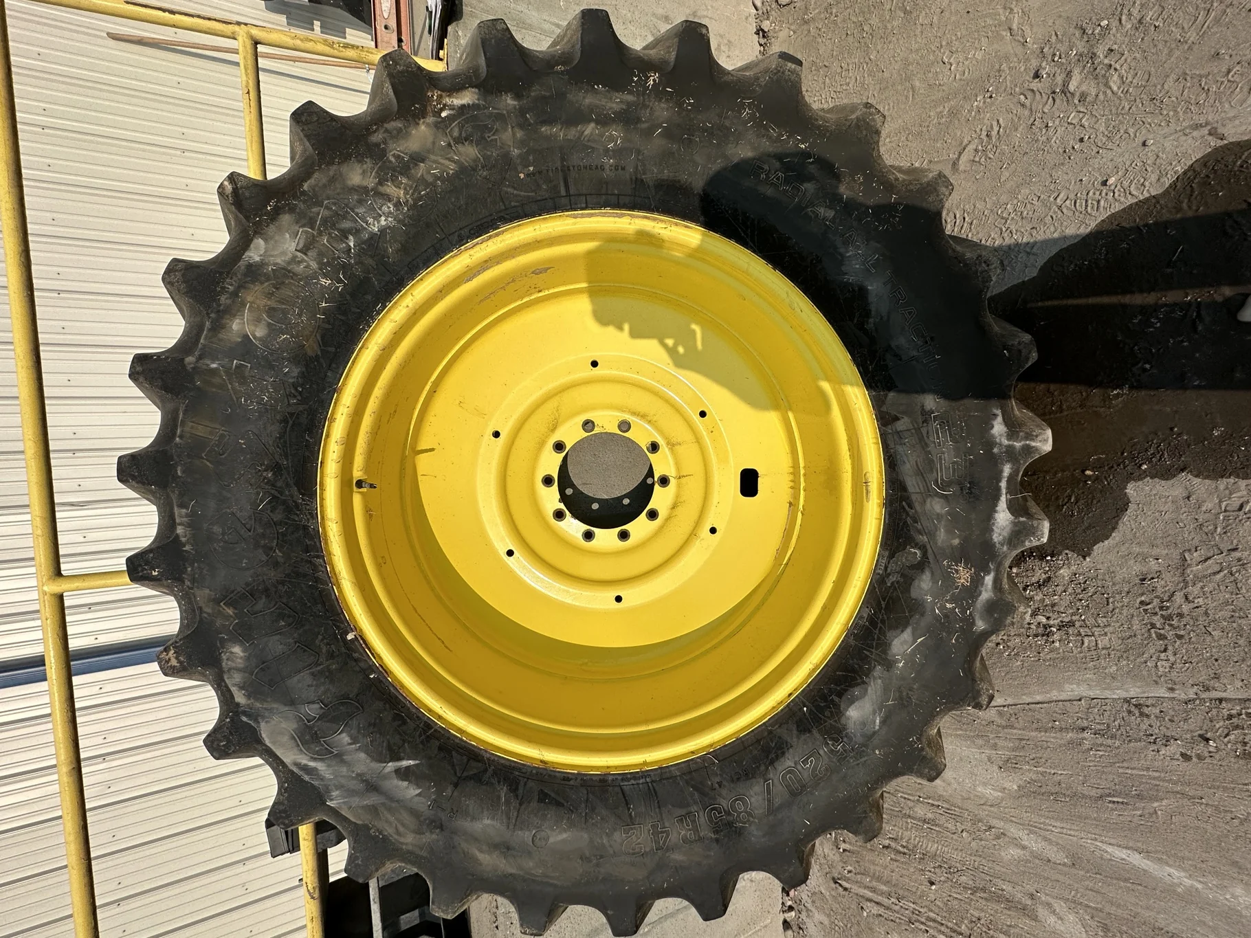 Used 80% 520/85R42 Firestone Radial Deep Tread 23 R-1W 167B TL on 18 x 42 John Deere Yellow 10 Bolt image 2
