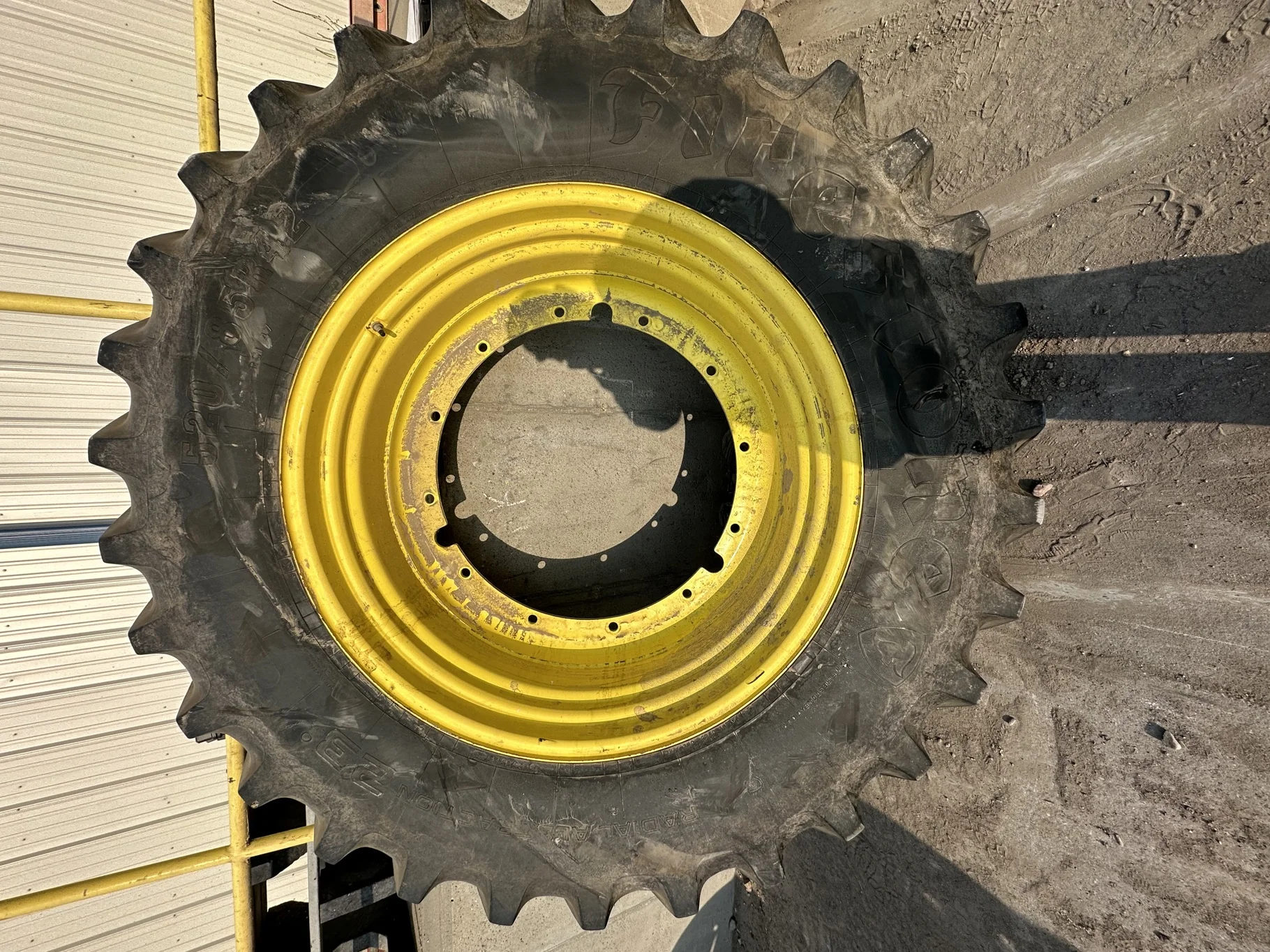 Used 85% 520/85R42 Firestone Radial Deep Tread 23 R-1W 157B TL on 18 x 42 JD Stub Disc - Fair Condi image 2